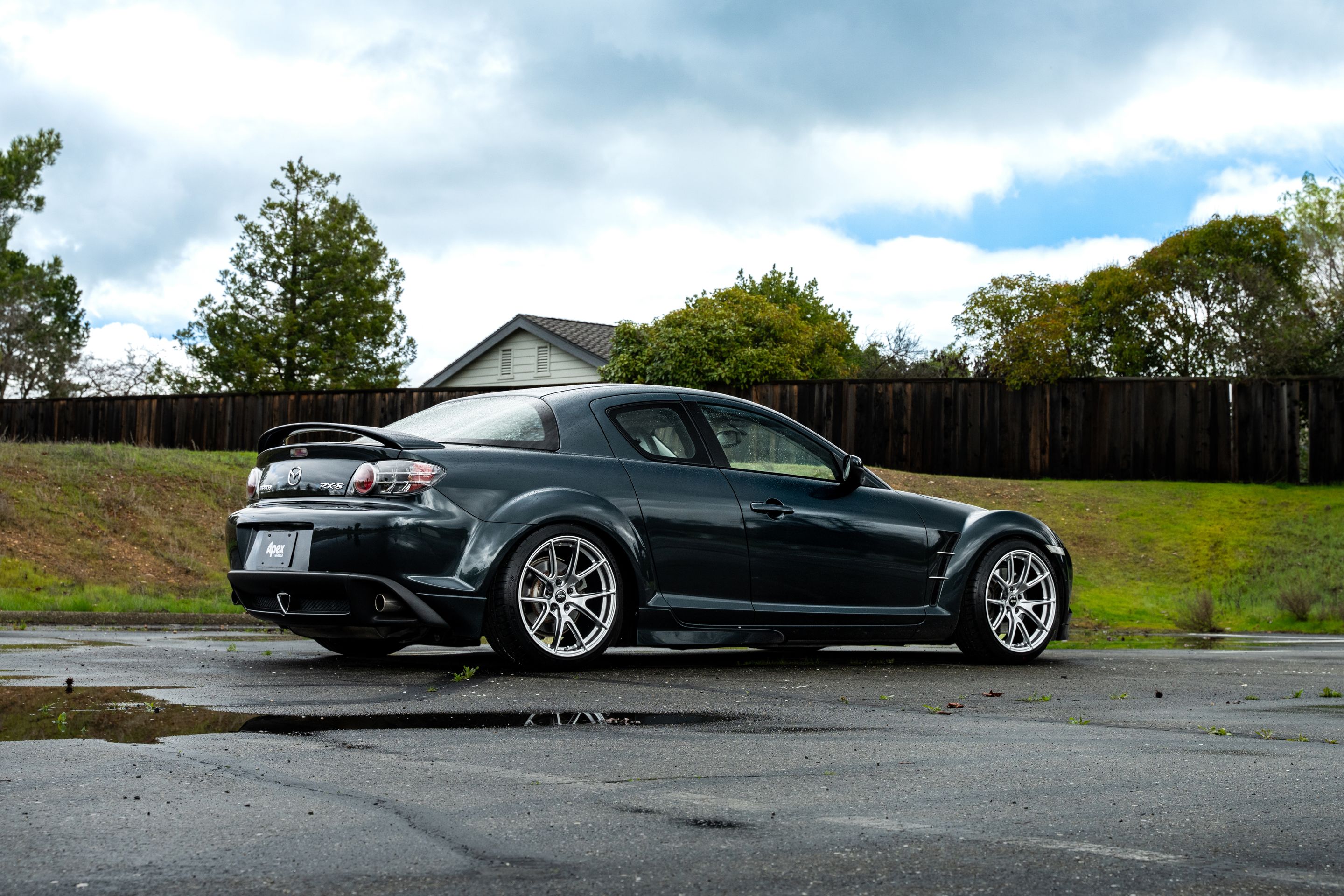 Green Mazda RX-8 with 18" VS-5 Apex wheels in Hyper Black