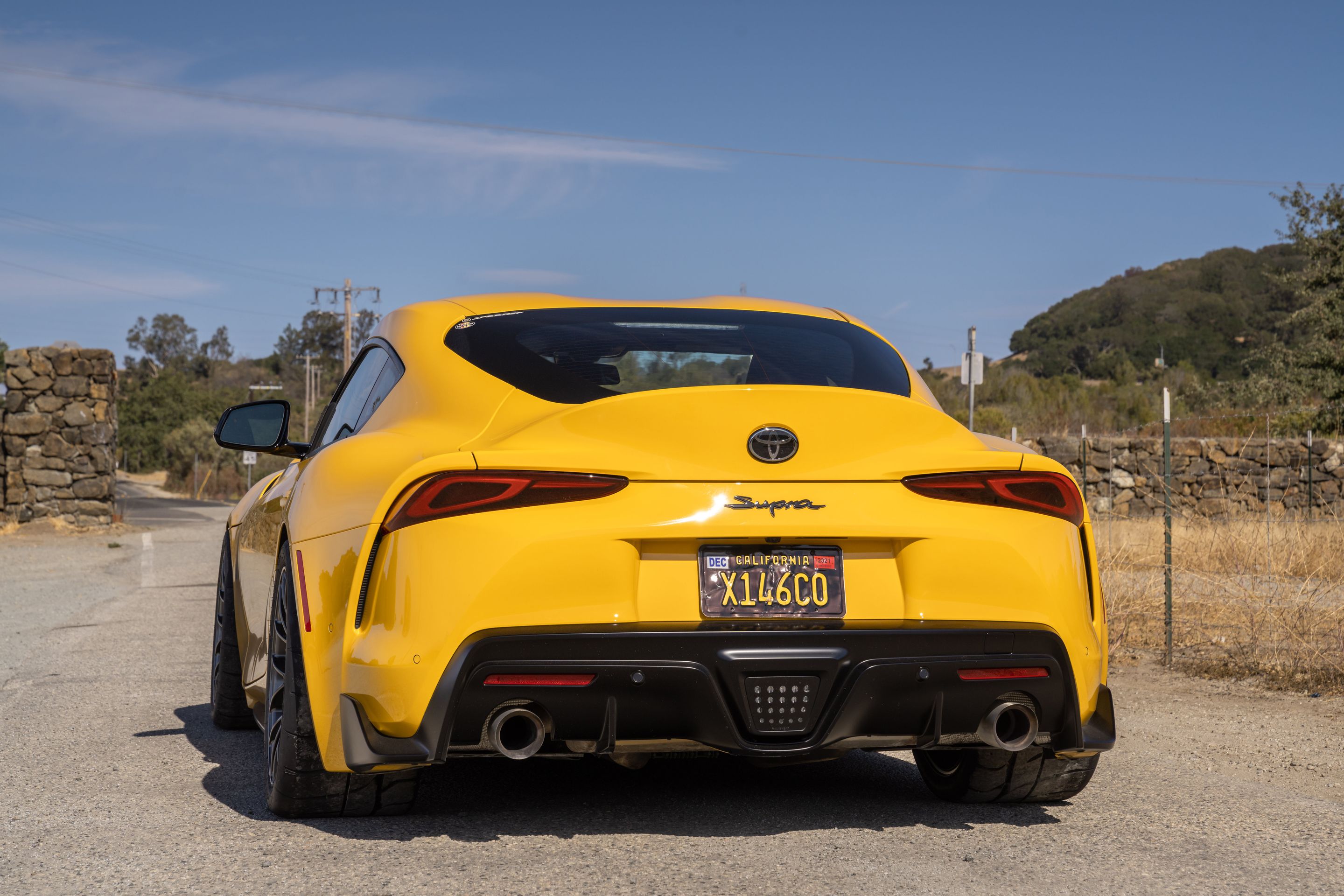 Yellow Toyota GR Supra with 18" EC-7RS Apex wheels in Anthracite