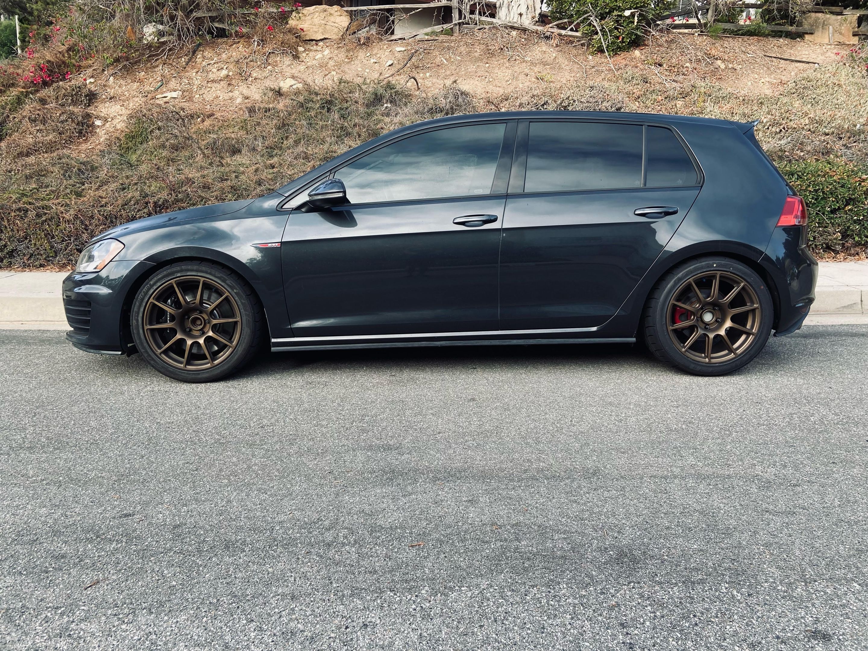Grey VW MK7 GTI with 17" SM-10 Apex wheels in Satin Bronze