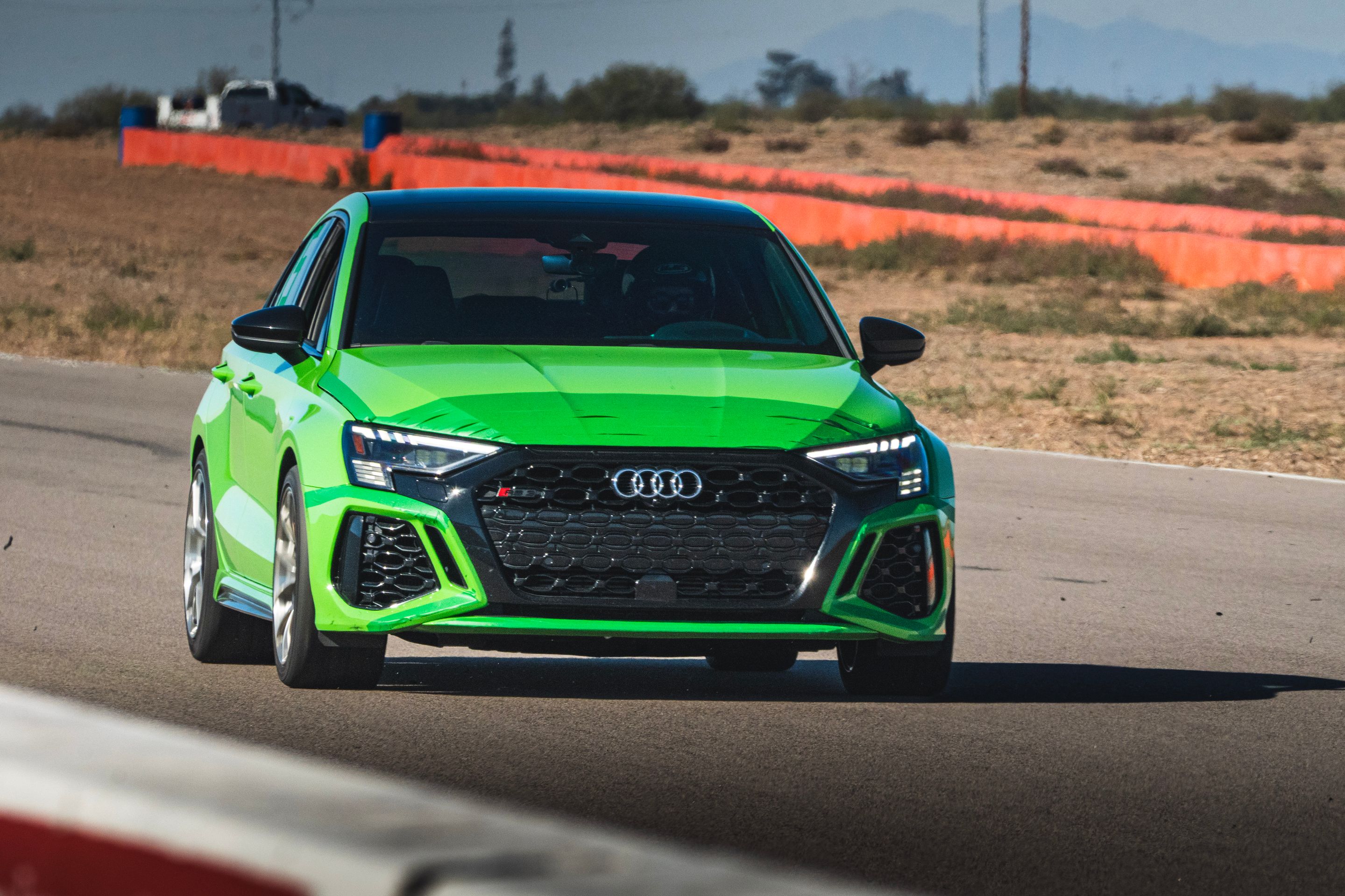 Green Audi 8Y RS 3 with 18" VS-5RS Apex wheels in Brushed Clear