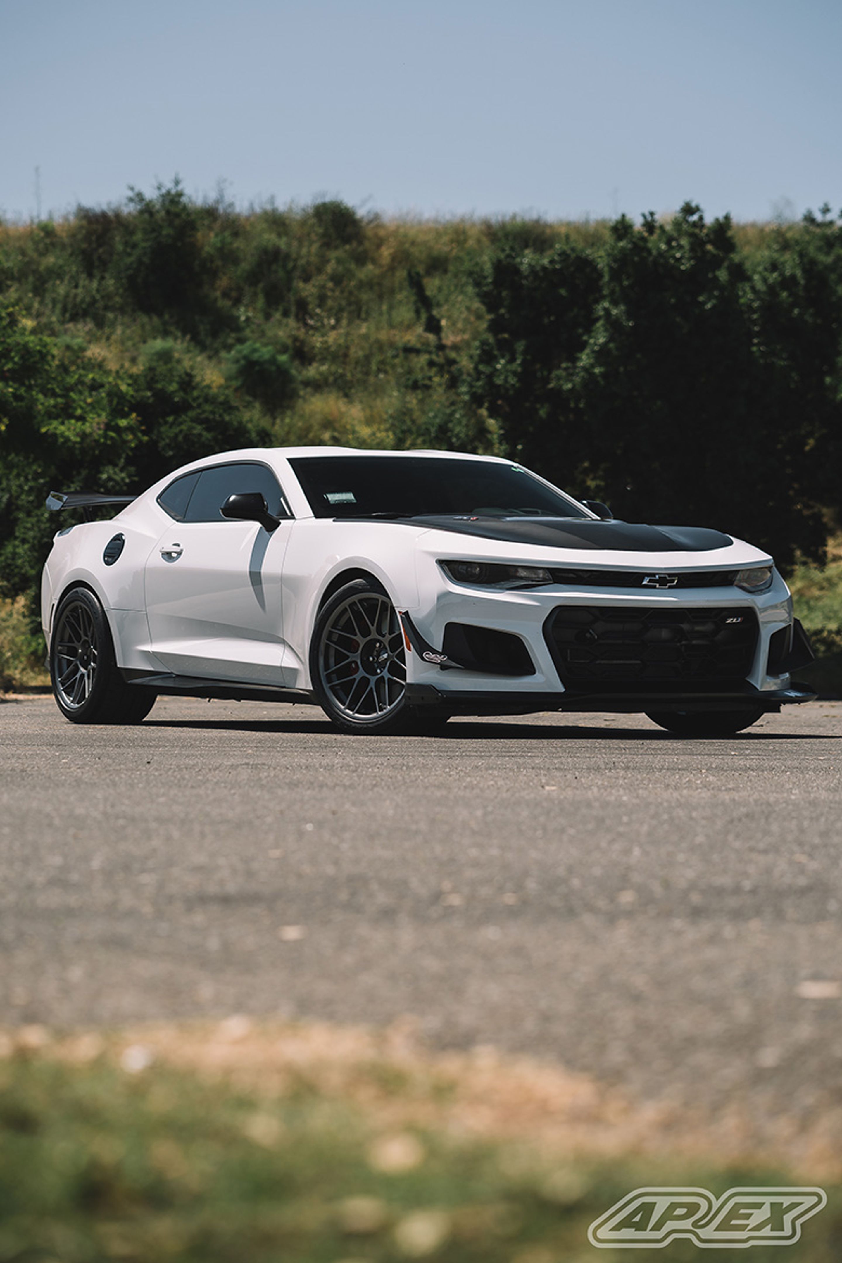 White Chevrolet 6th Gen Camaro ZL1 1LE with 19" ARC-8 Apex wheels in Anthracite