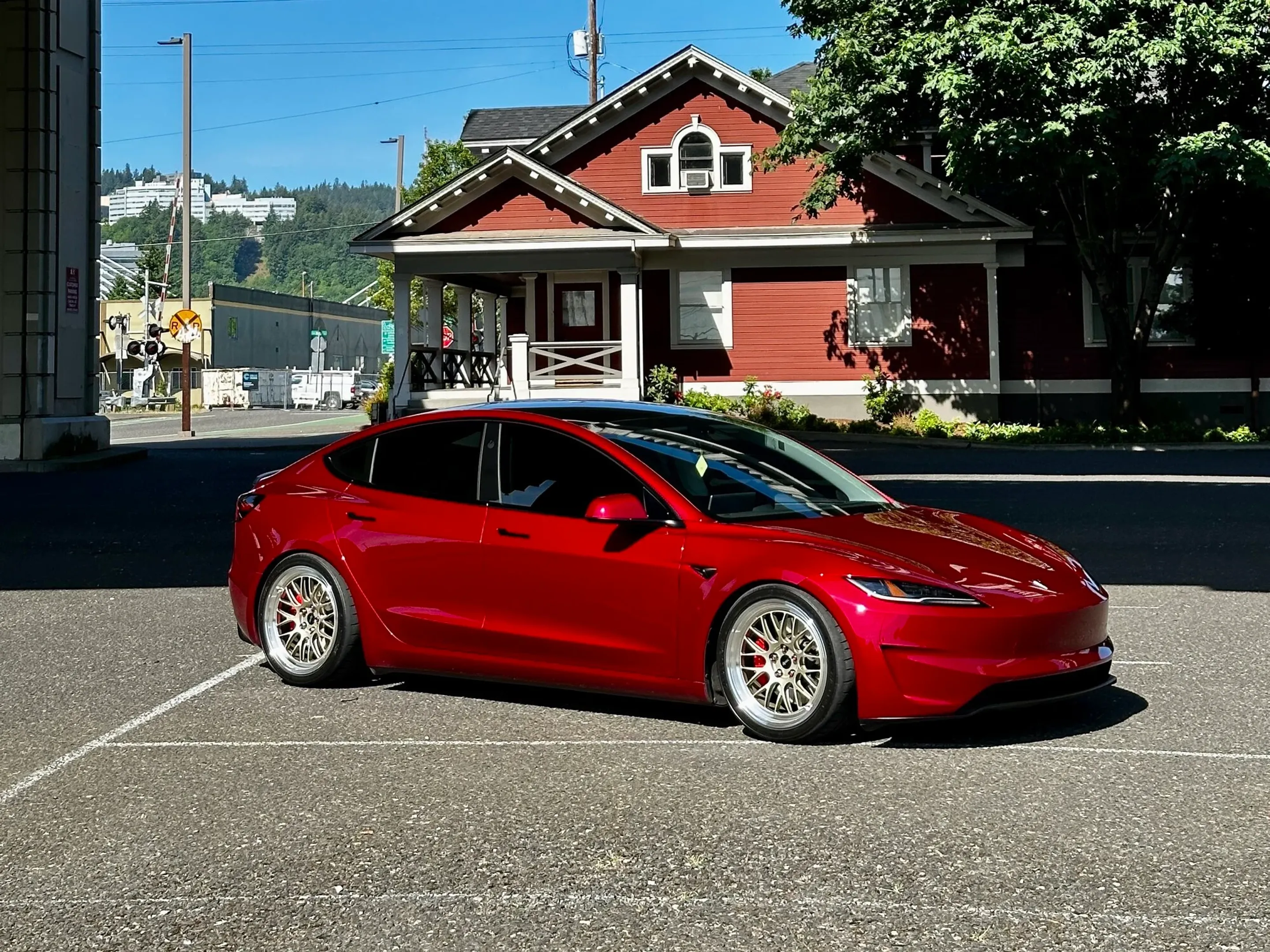 Red Tesla Model 3 with 19" ML-10RT Apex wheels in Machined Lip Gloss Motorsport Gold