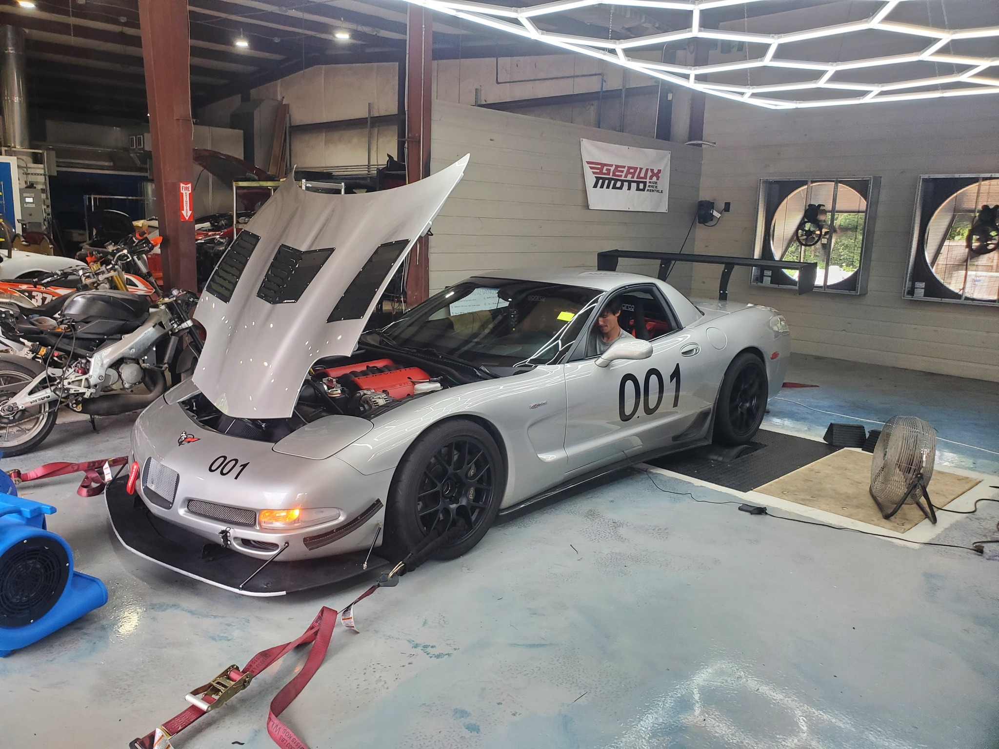 Silver Chevrolet C5 Corvette Z06 with 18" EC-7 Apex wheels in Satin Black