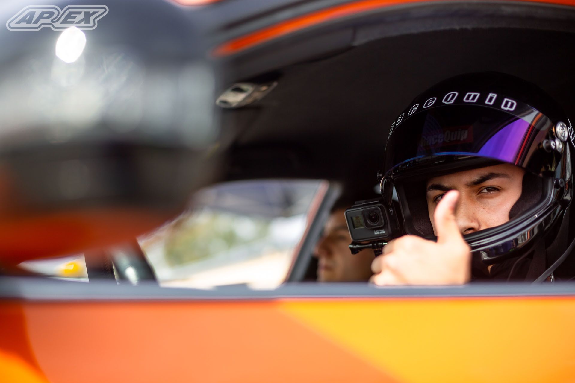 Orange Subaru GR WRX STI with 18" EC-7 Apex wheels in Satin Black