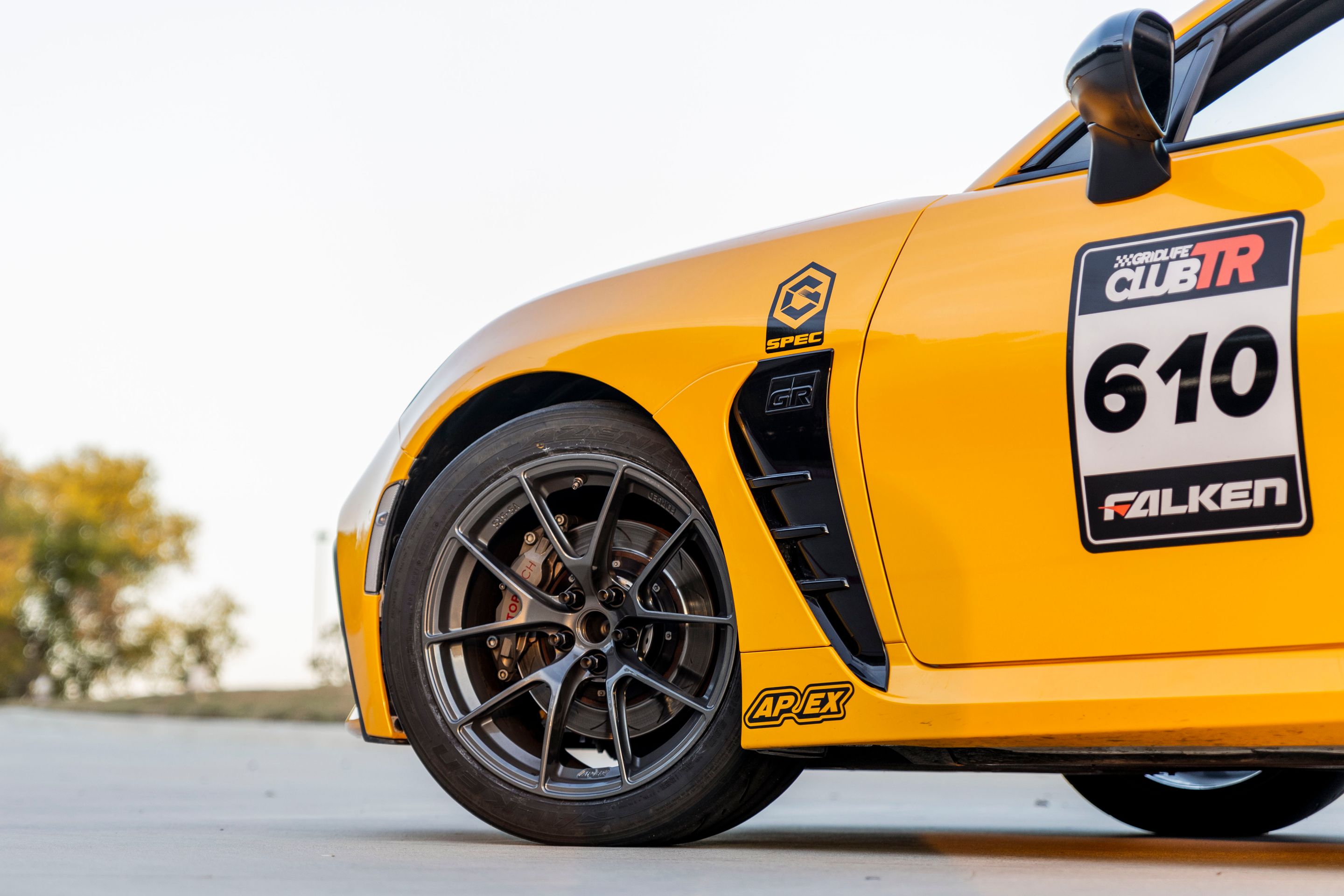 Yellow Toyota GR86 with 17" VS-5RS Apex wheels in Anthracite