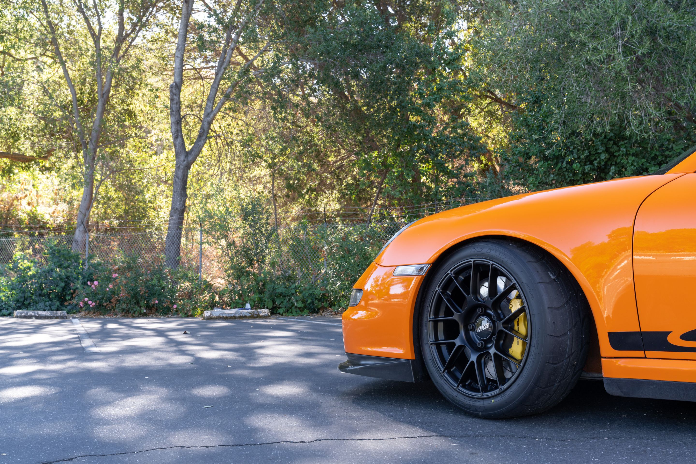 Orange Porsche 911 997 GT3 RS with 18" EC-7RS Apex wheels in Satin Black
