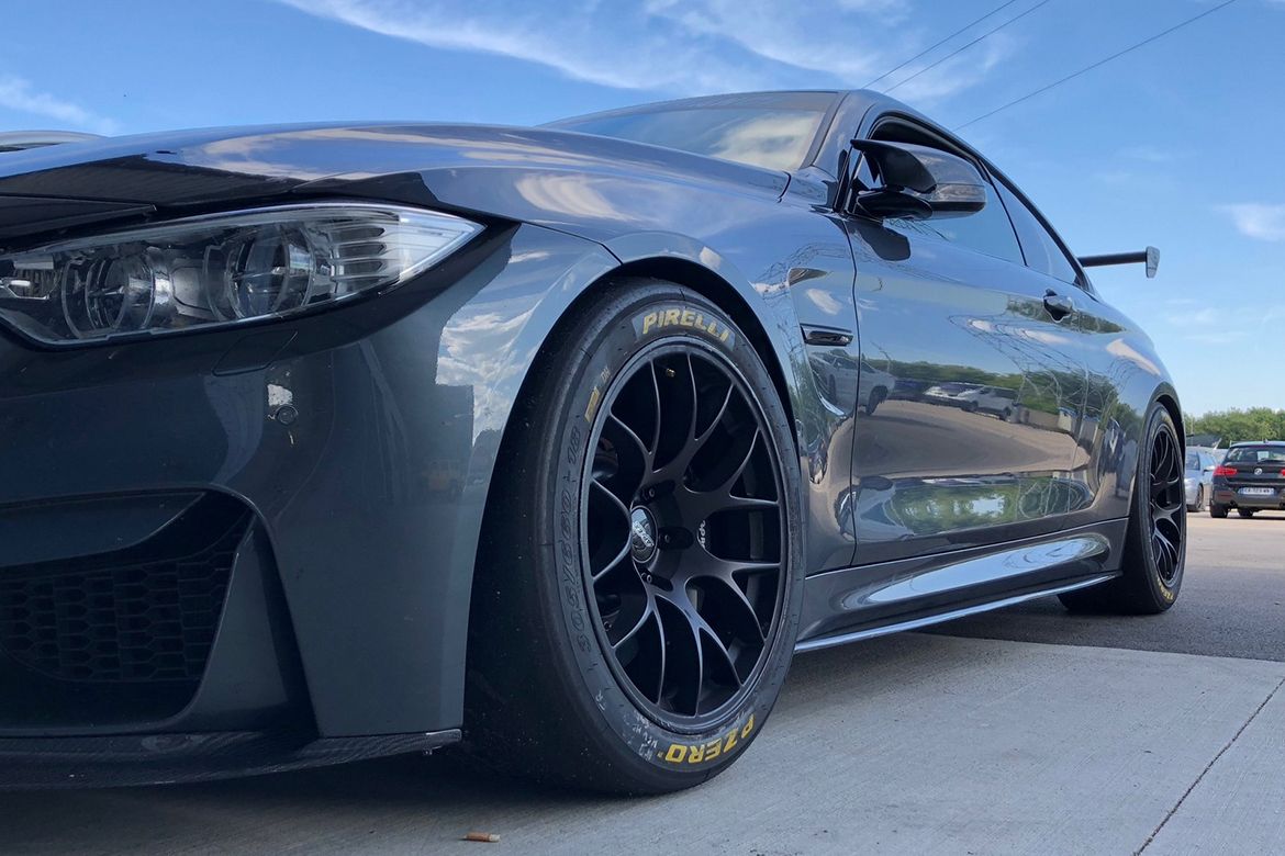 Grey BMW F82 Coupe M4 with 18" EC-7 Apex wheels in Satin Black