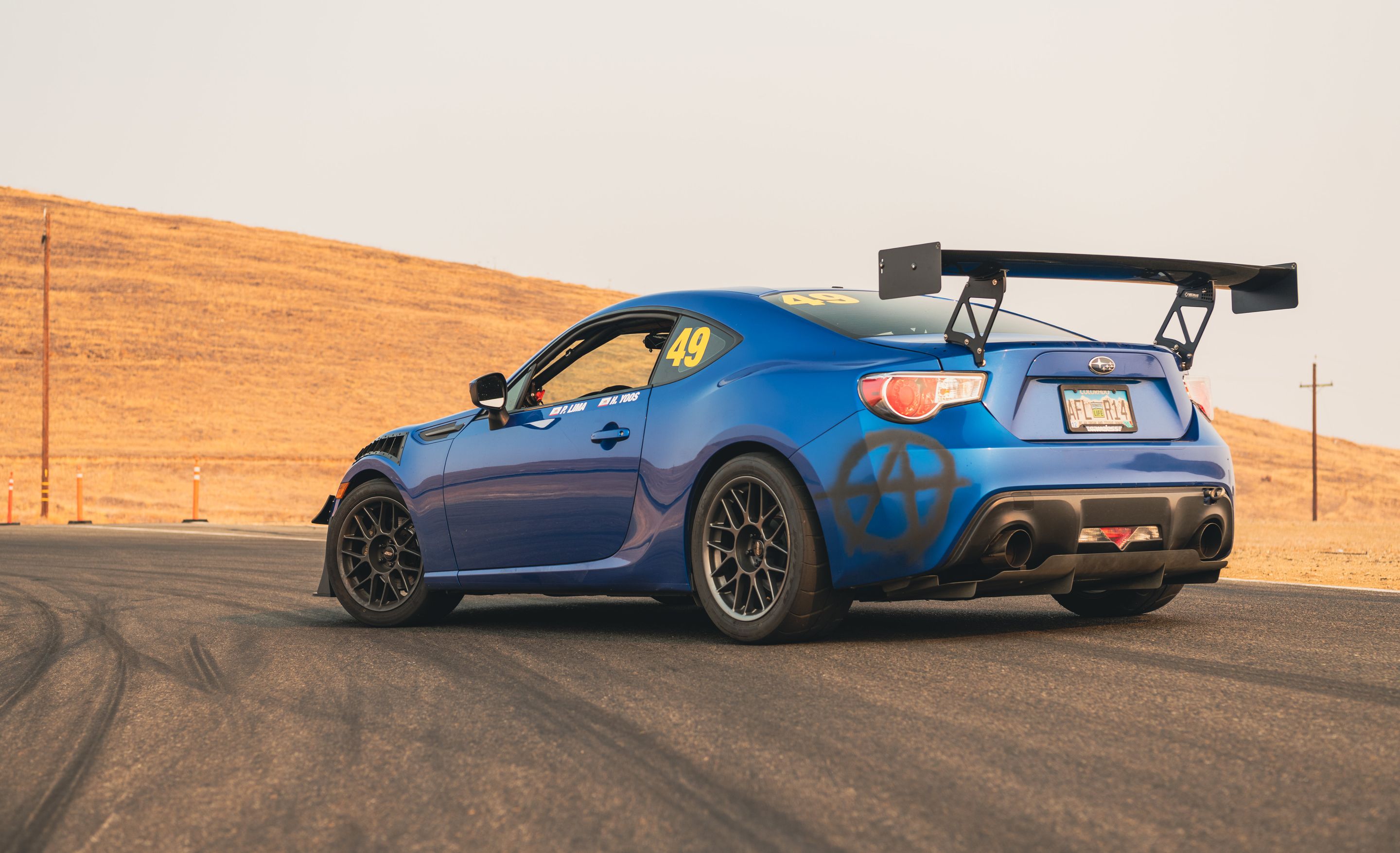 Blue Subaru ZC6 / Gen 1 BRZ with 17" ARC-8 Apex wheels in Anthracite