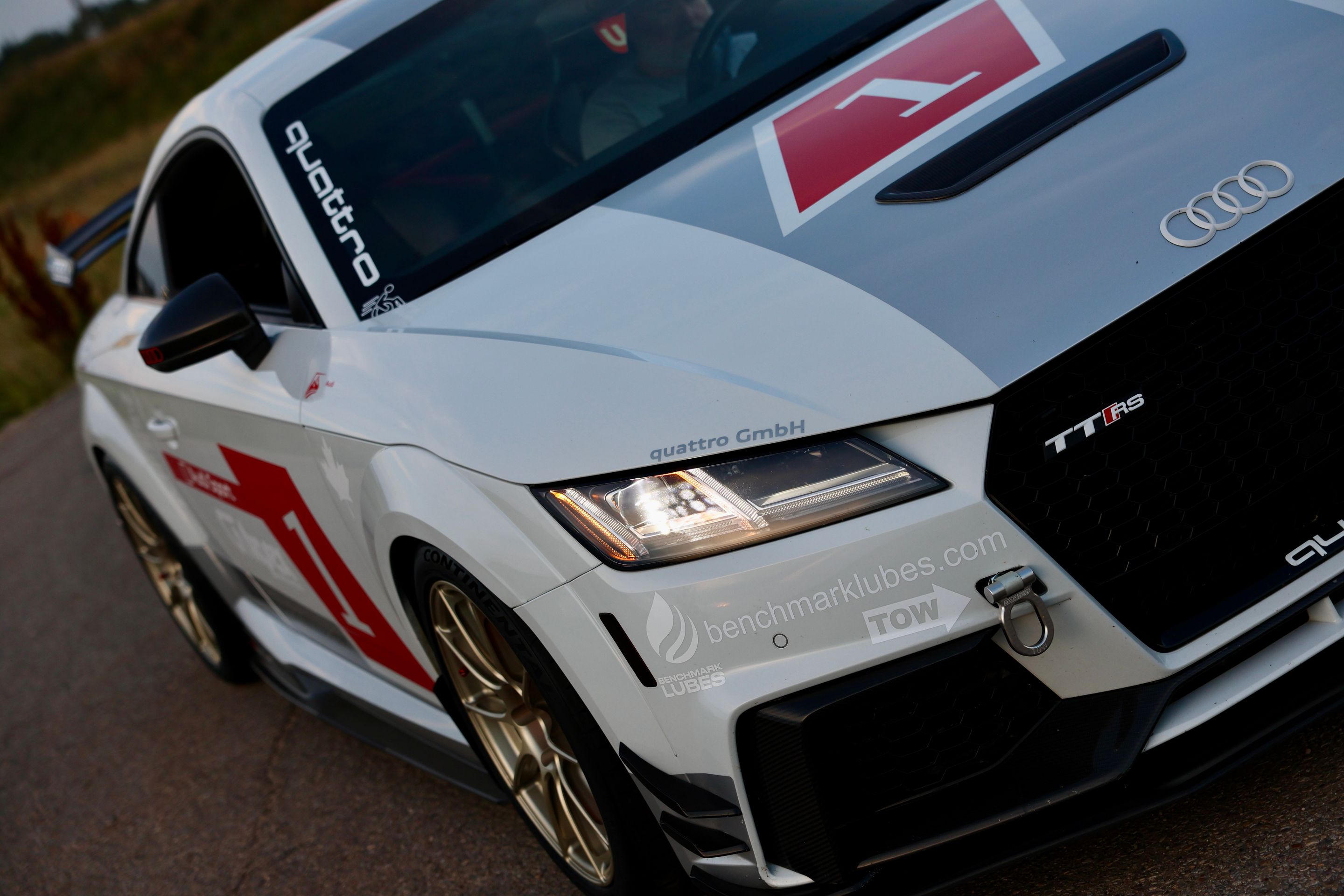White Audi FV/8S TT RS with 18" SM-10RS Apex wheels in Motorsport Gold