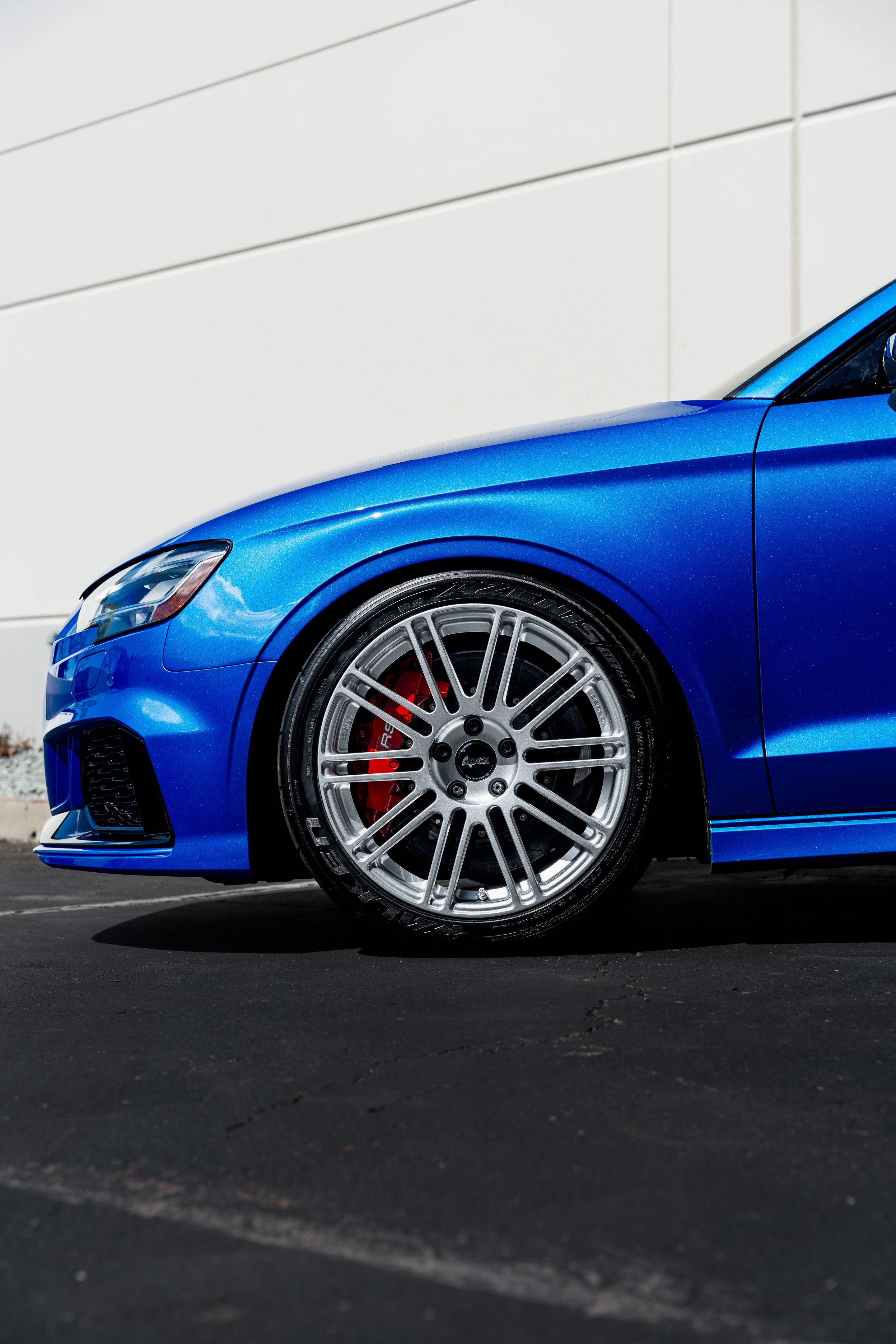 Blue Audi 8V RS 3 with 18" TC-10RT Apex wheels in Race Silver