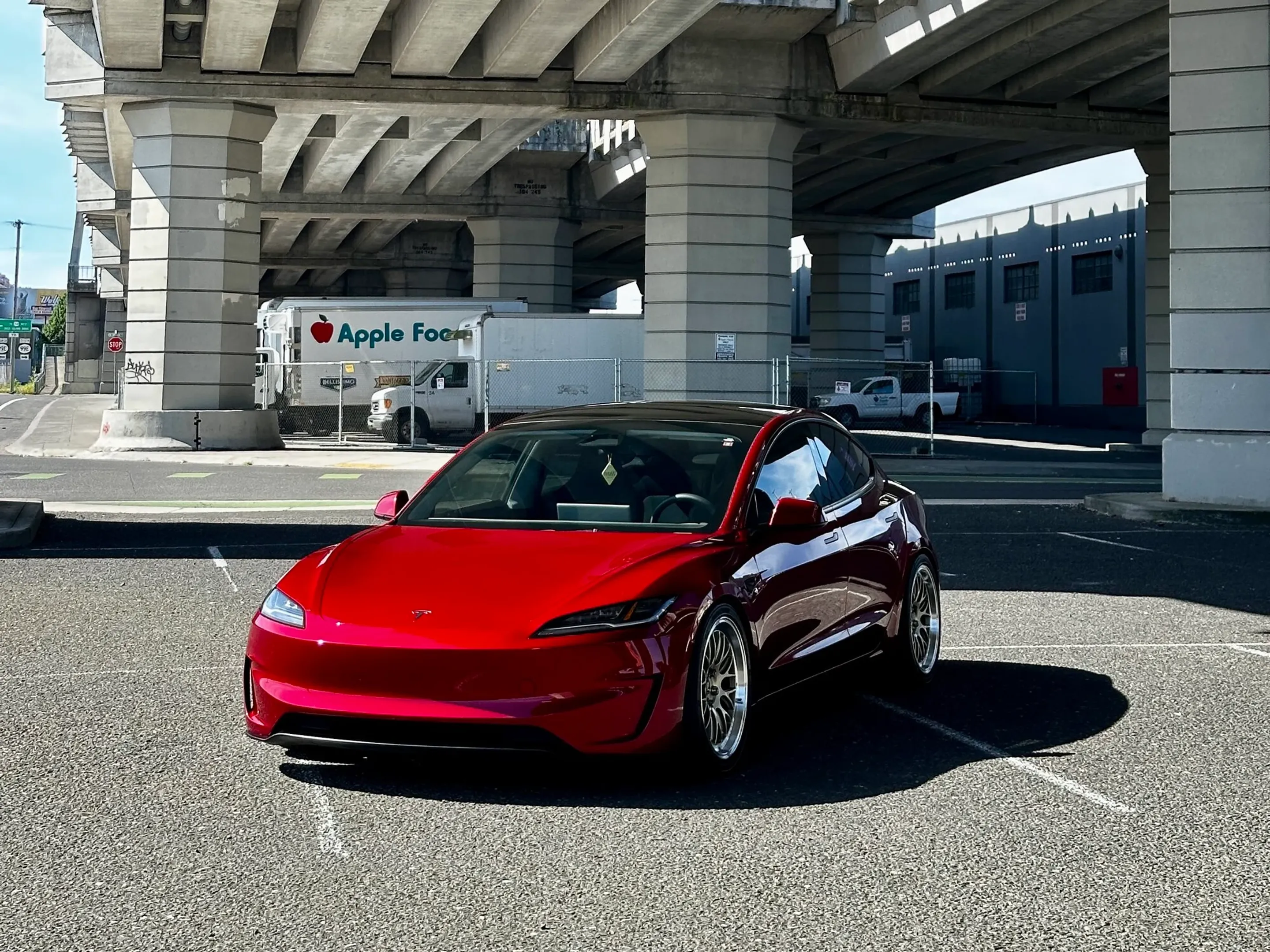 Red Tesla Model 3 with 19" ML-10RT Apex wheels in Machined Lip Gloss Motorsport Gold