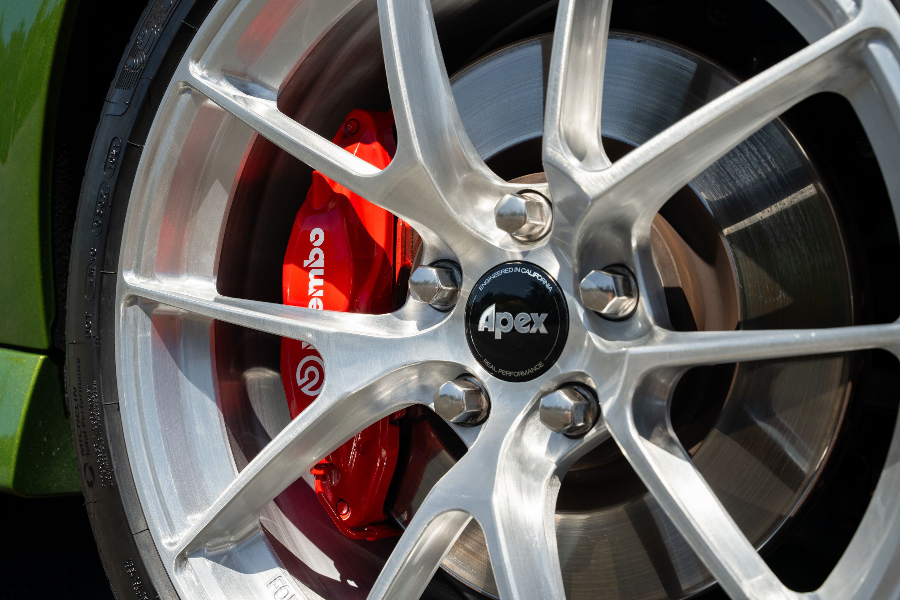 Green Chevrolet SS with 19" VS-5RS Apex wheels in Brushed Clear