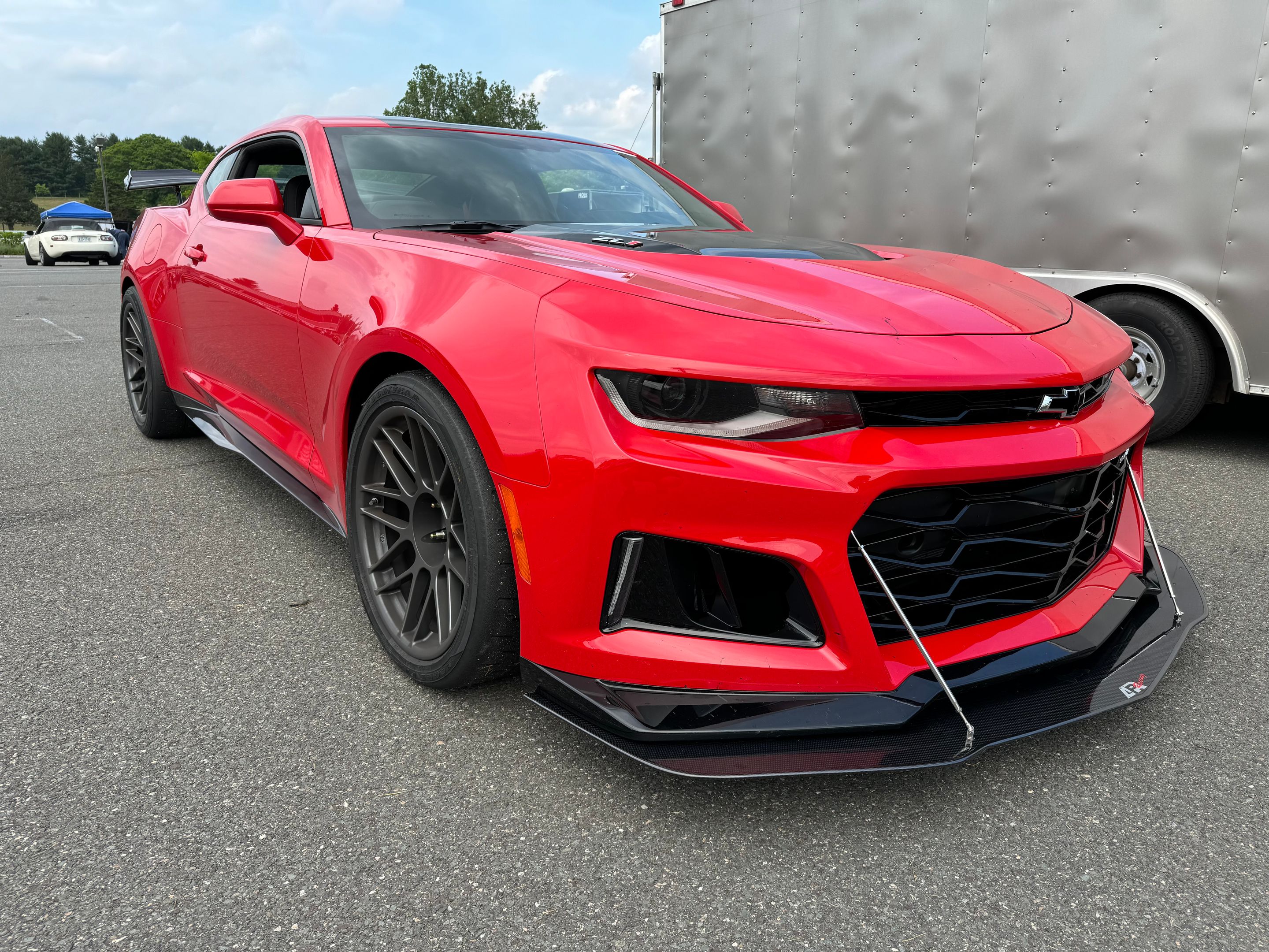 Red Chevrolet 6th Gen Camaro ZL1 1LE with 19" ARC-8 Apex wheels in Anthracite