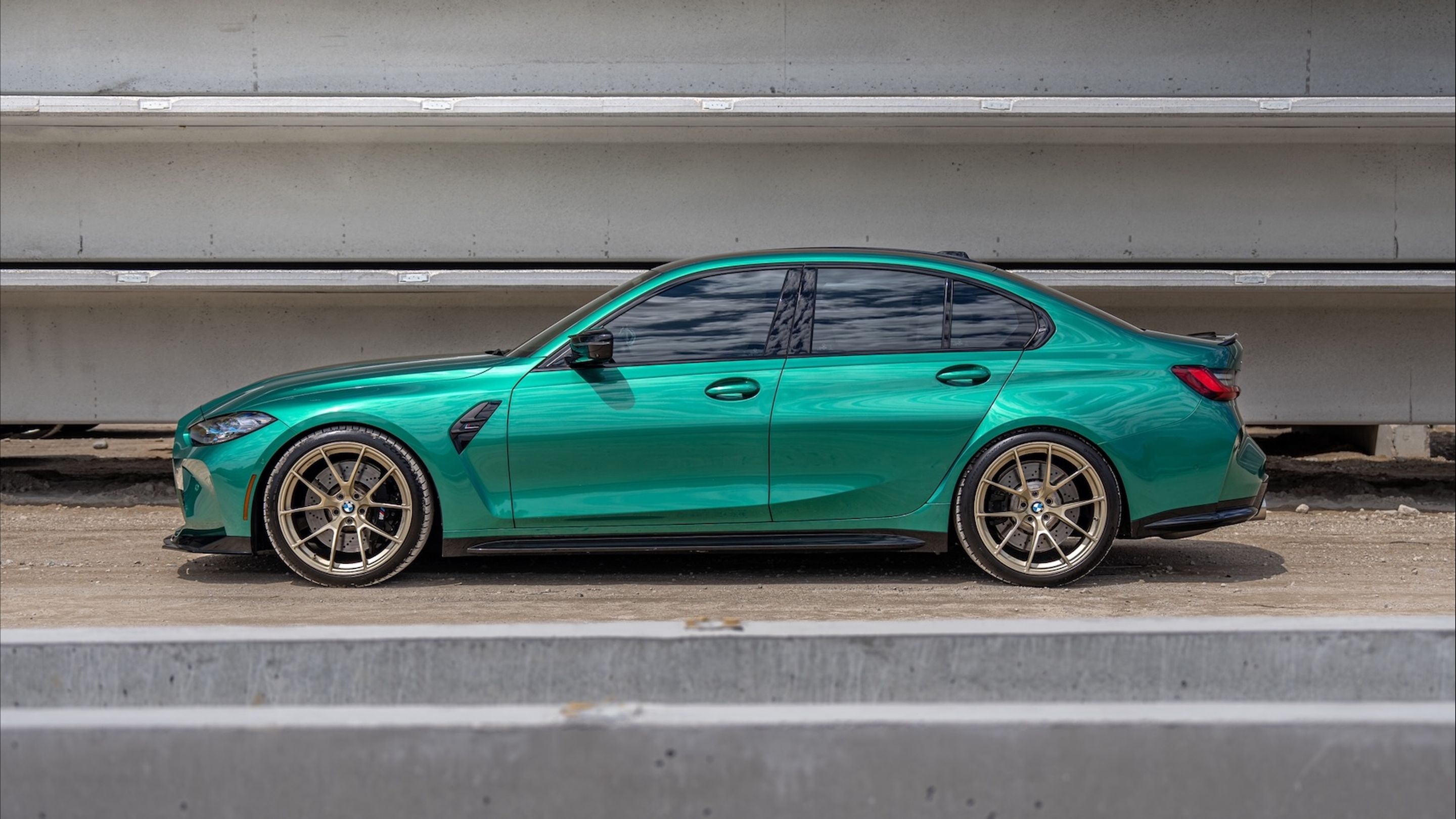 Green BMW G80 M3 with 20" VS-5RS Apex wheels in Motorsport Gold