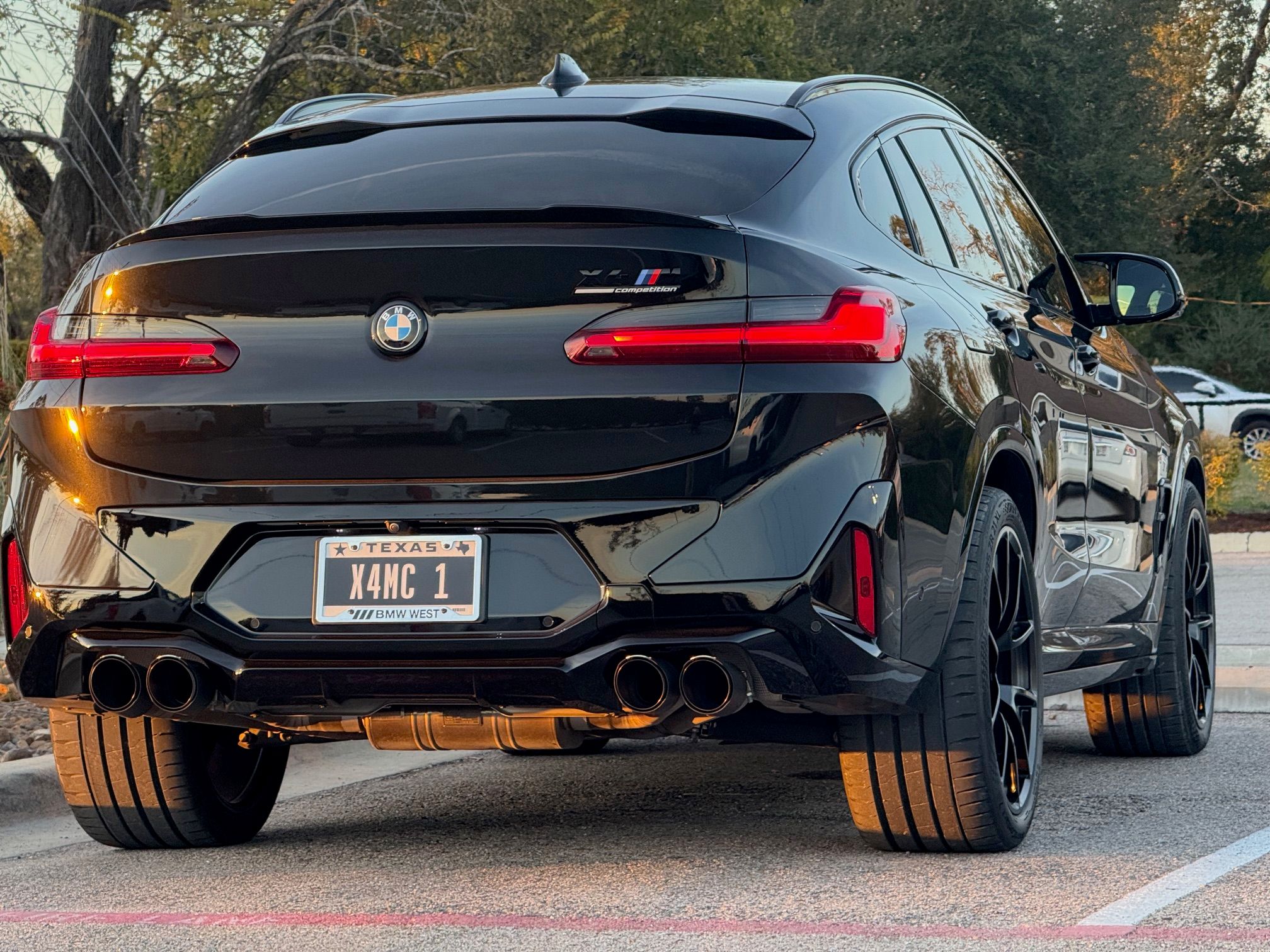 Black BMW F98 X4M with 21" VS-5RX Apex wheels in Satin Black