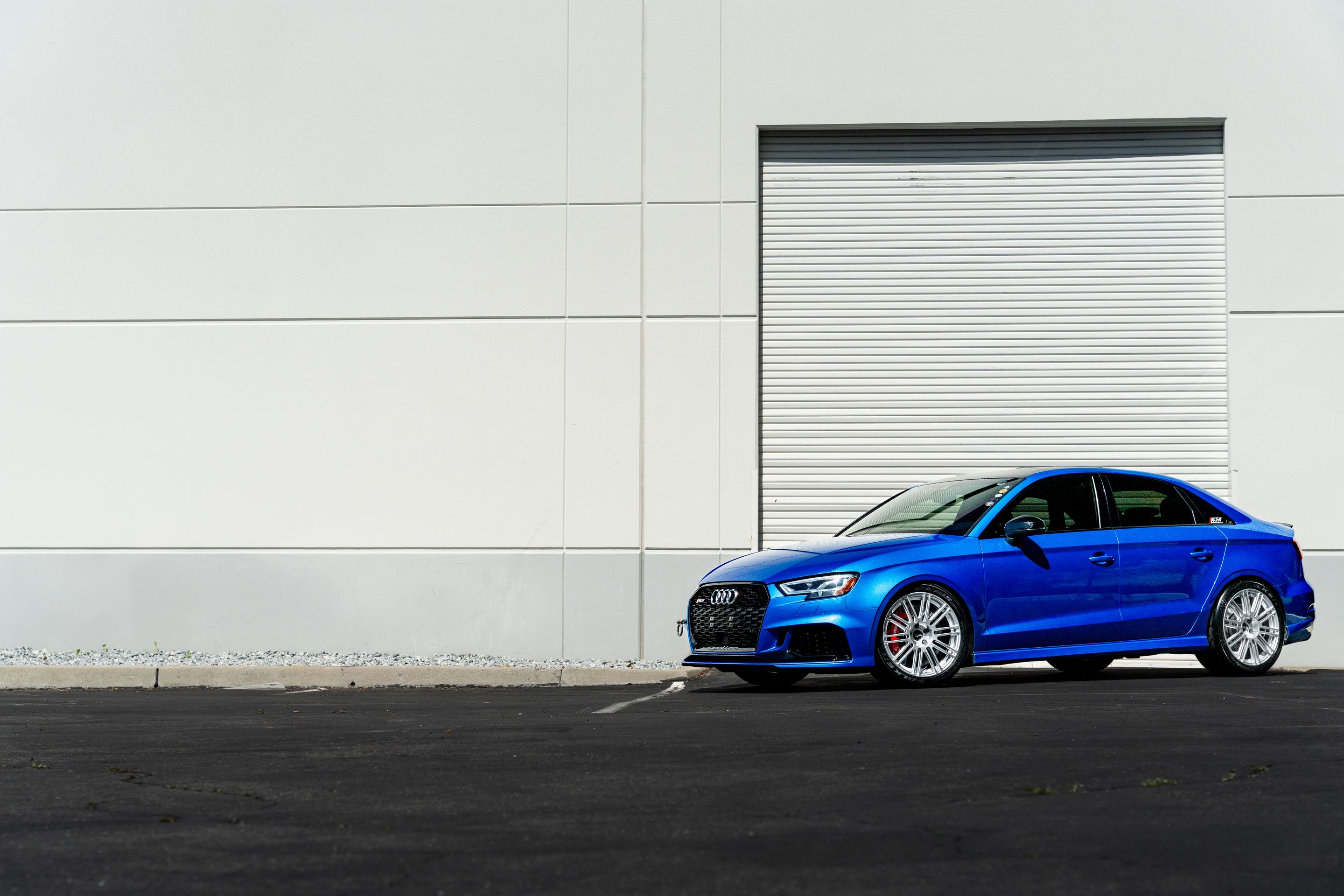 Blue Audi 8V RS 3 with 18" TC-10RT Apex wheels in Race Silver