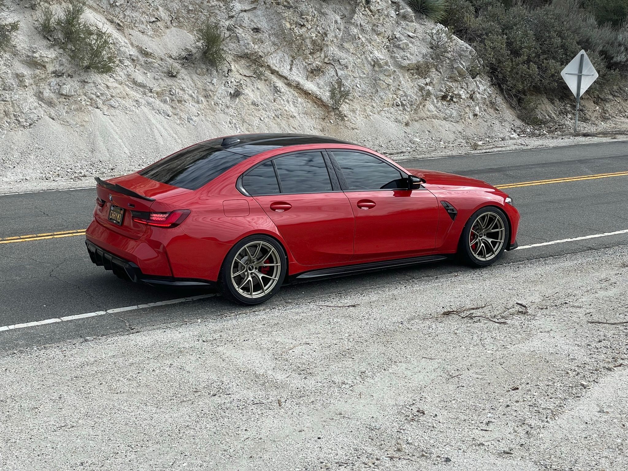 Red BMW G80 M3 with 19" VS-5RS Apex wheels in Motorsport Gold