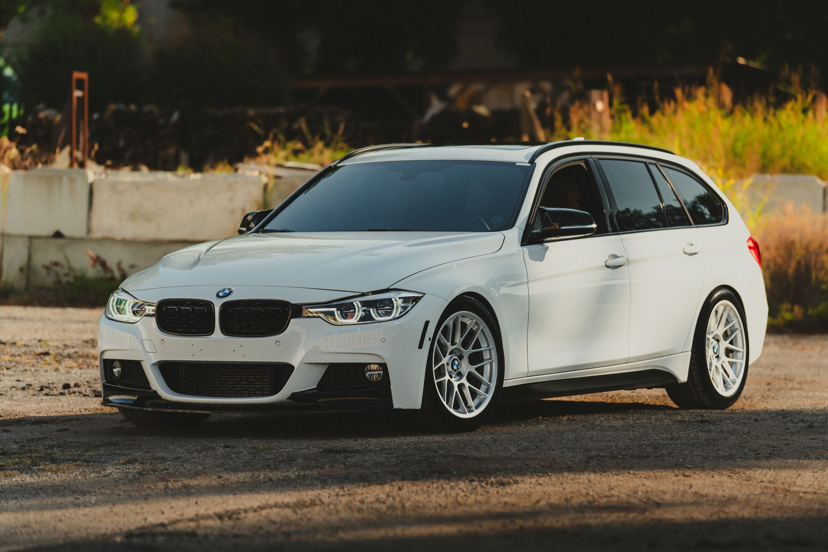 White BMW F31 Wagon 3 Series with 18" ARC-8 Apex wheels in Race Silver