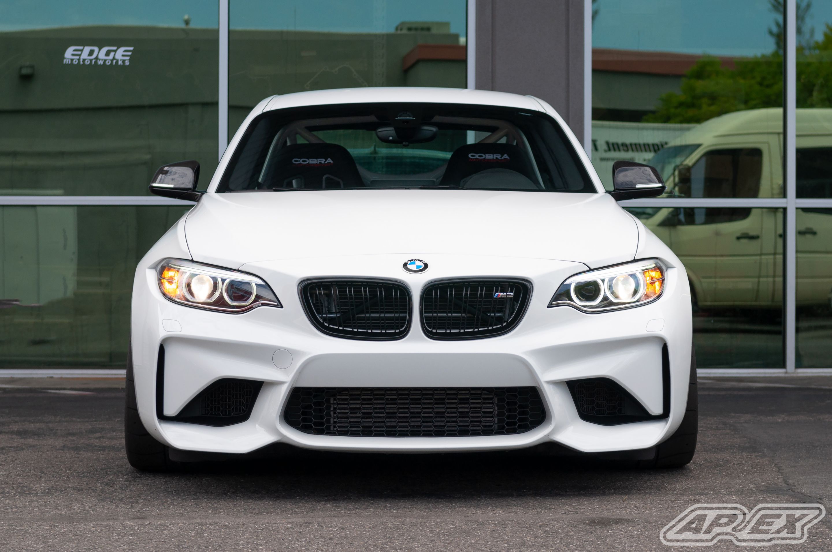 White BMW F87 M2 with 18" FL-5 Apex wheels in Satin Black