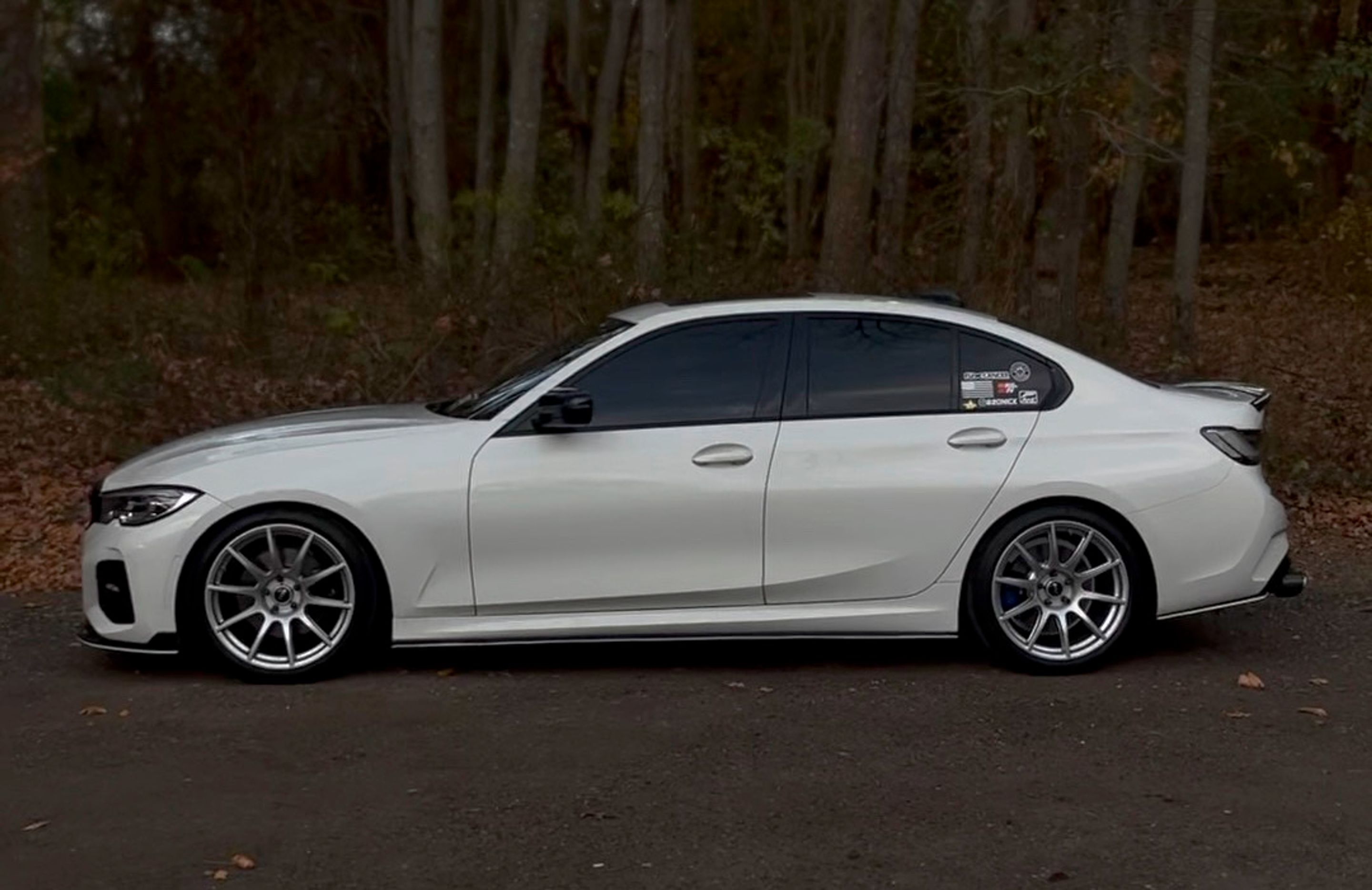 White BMW G20 Sedan 3 Series with 19" SM-10 Apex wheels in Race Silver