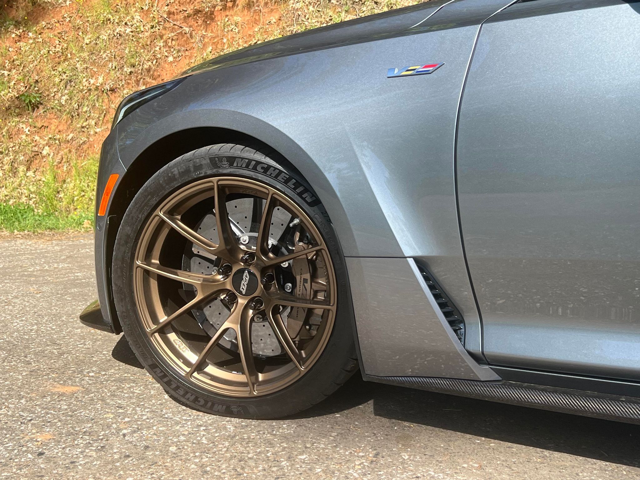 Grey Cadillac CT5-V Blackwing with 19" VS-5RS Apex wheels in Satin Bronze