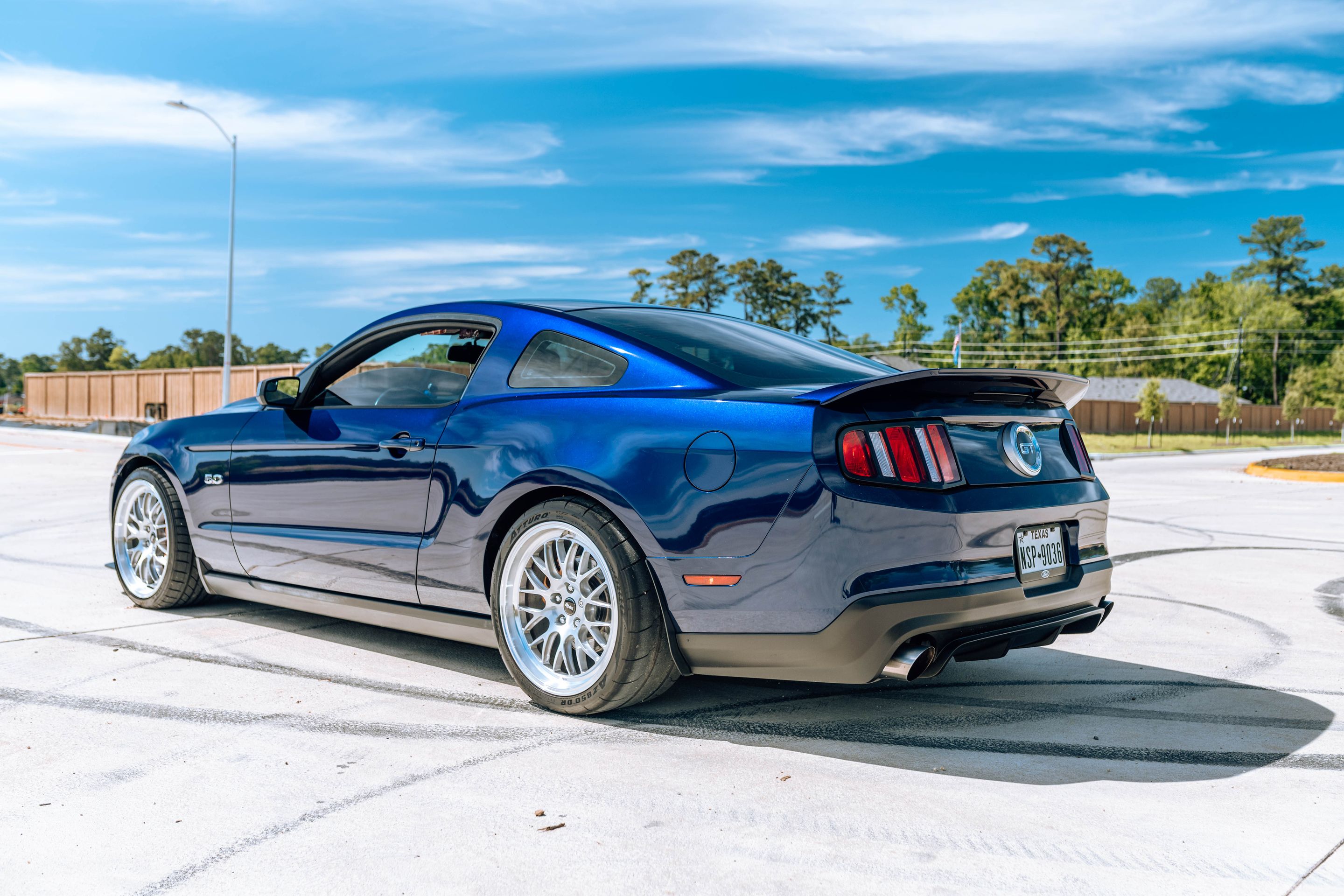 Blue Ford S197 Mustang GT with 19" ML-10RT Apex wheels in Machined Lip Brushed Clear