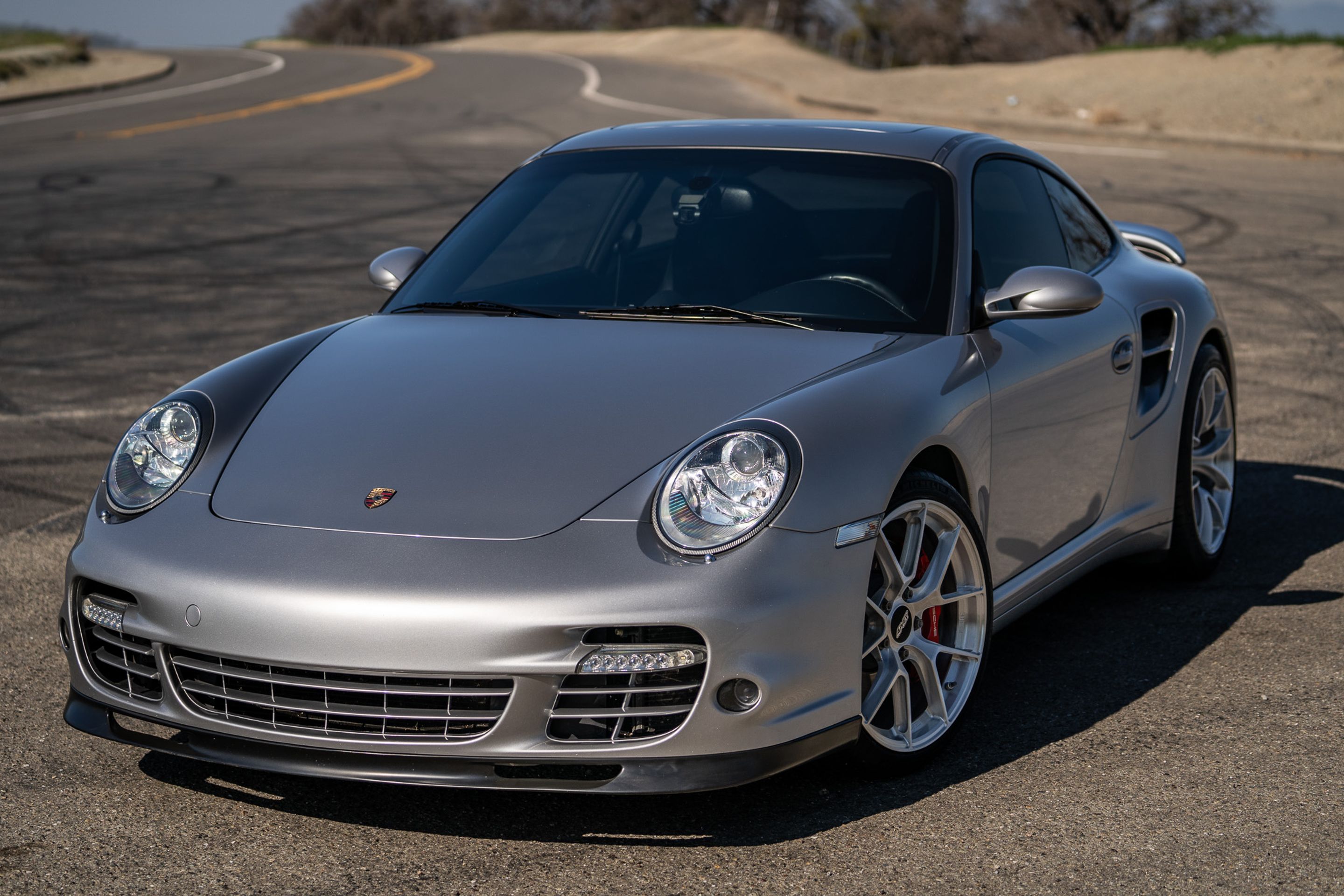 Silver Porsche 911 997 Turbo with 19" VS-5RS Apex wheels in Brushed Clear