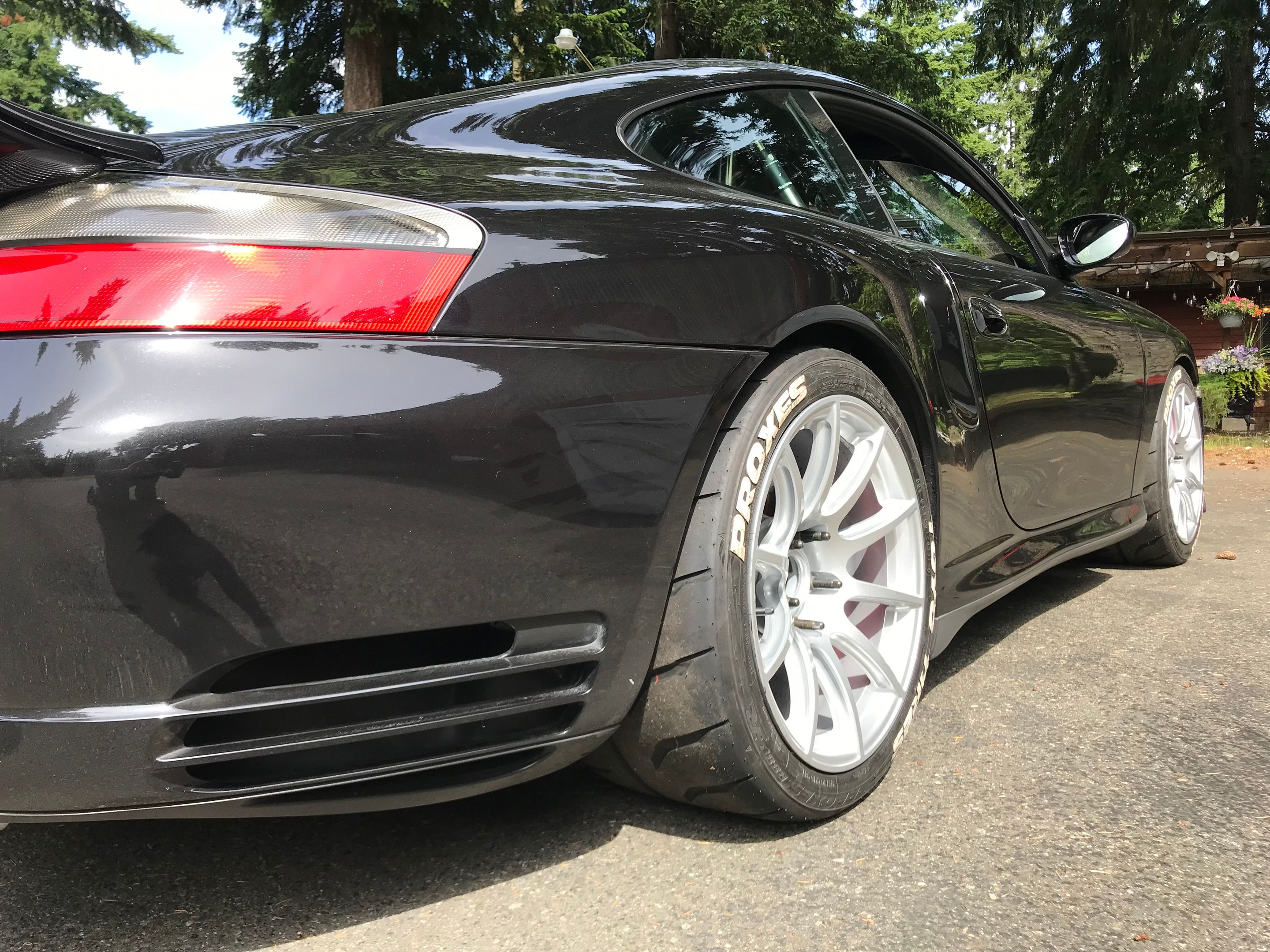 Black Porsche 911 996 Turbo with 18" SM-10 Apex wheels in Race Silver