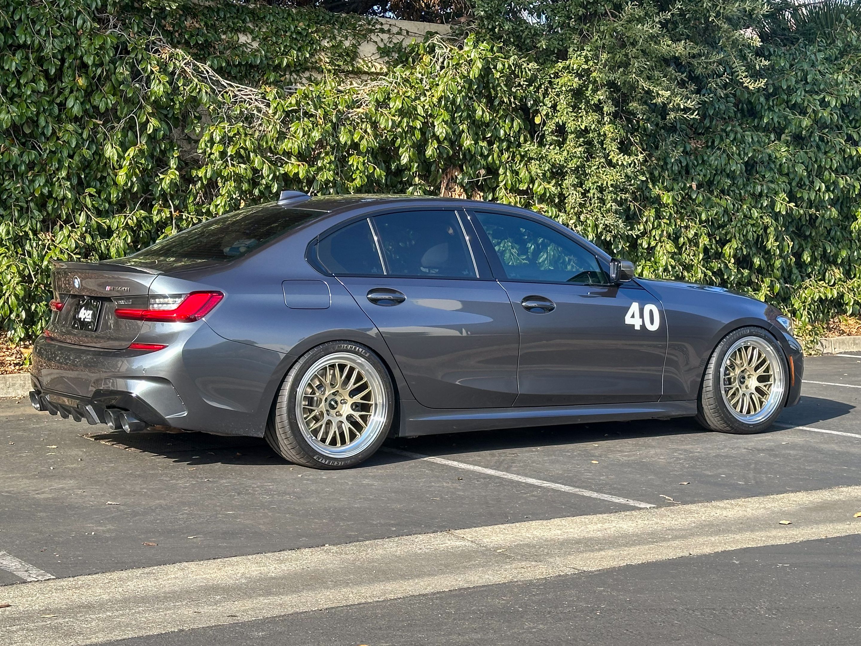 Grey BMW G20 Sedan 3 Series with 19" ML-10RT Apex wheels in Machined Lip Gloss Motorsport Gold