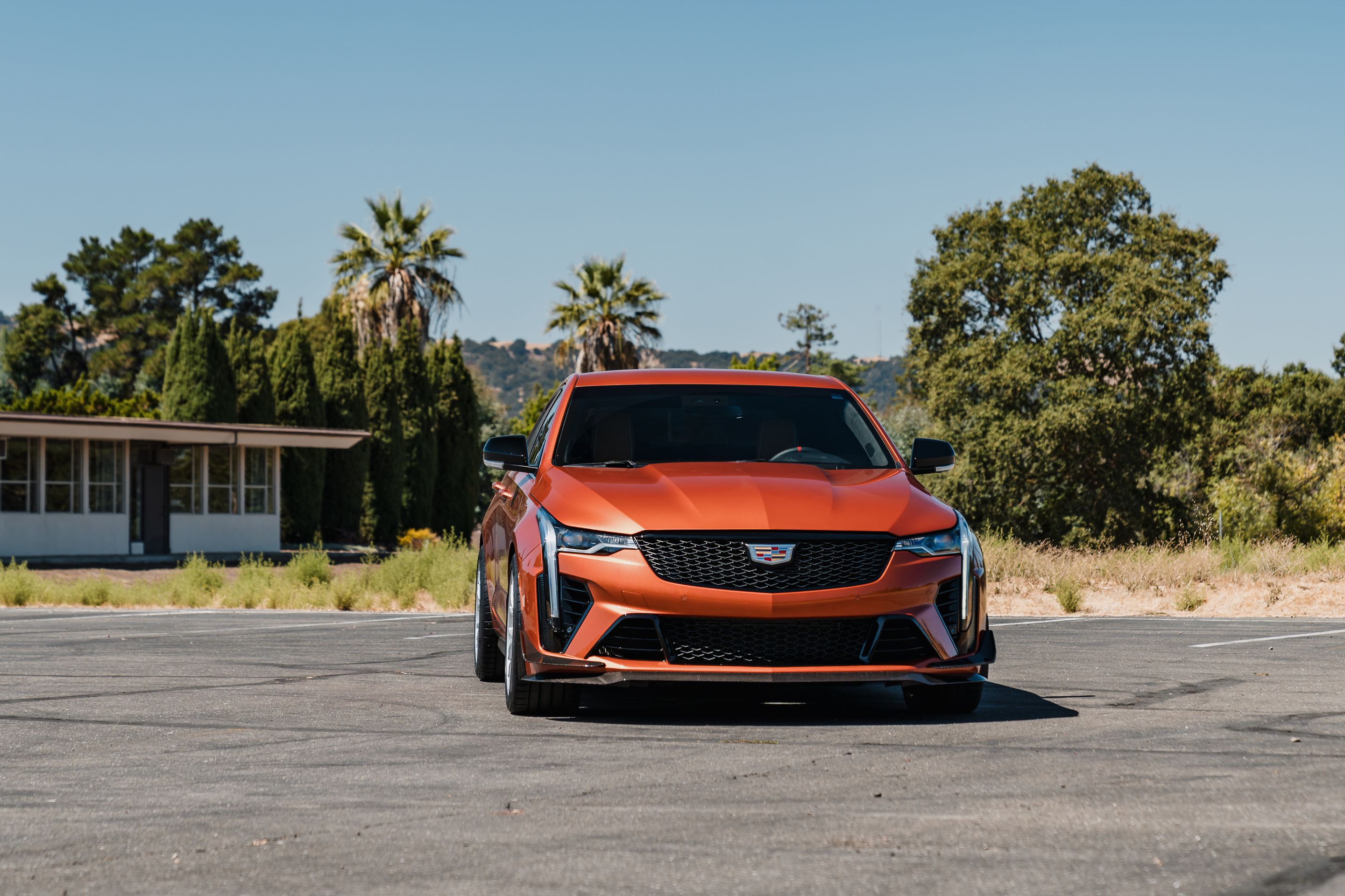 Orange Cadillac CT4-V Blackwing with 18" EC-7 Apex wheels in Race Silver