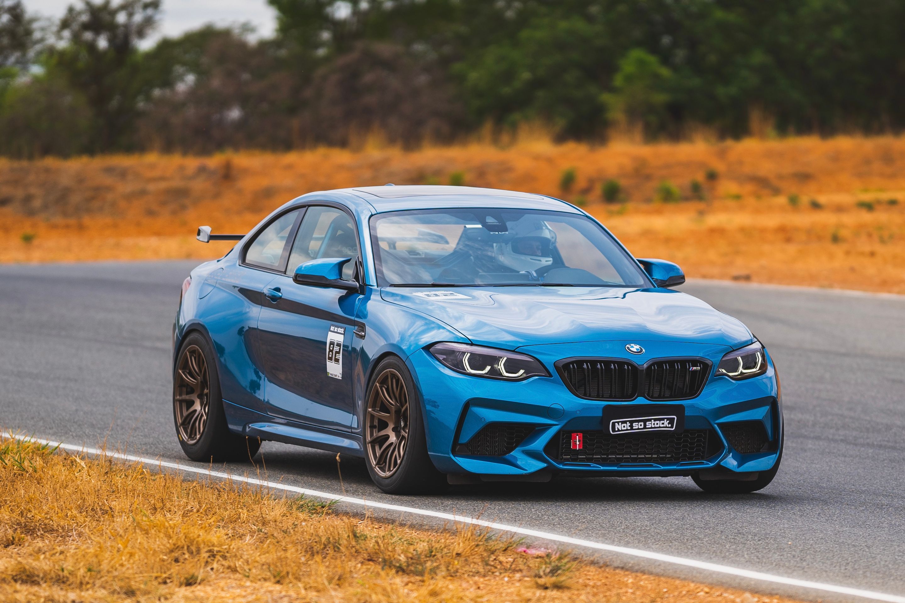 Blue BMW F87 M2 with 18" SM-10 Apex wheels in Custom Finish