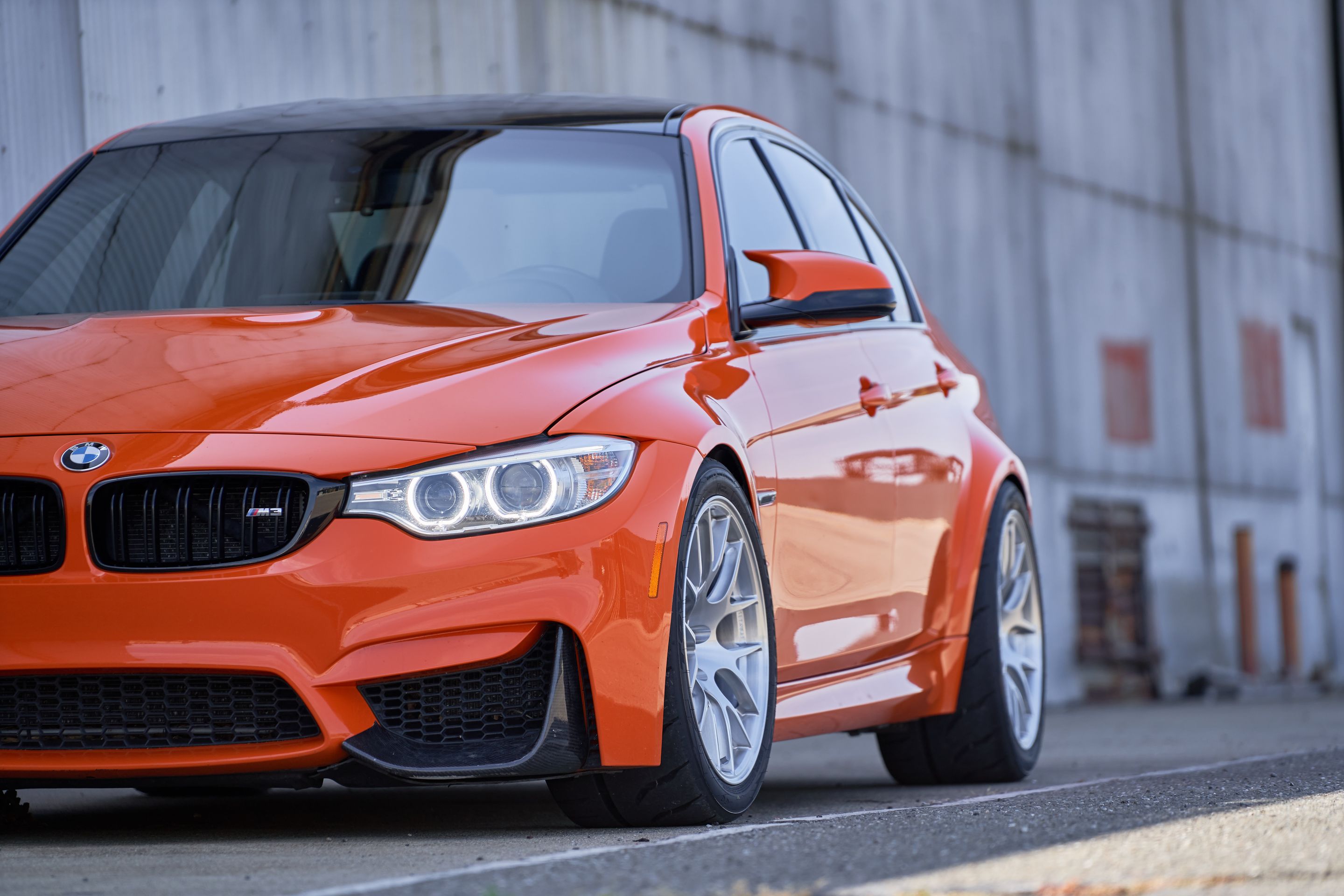 Orange BMW F80 M3 with 18" EC-7R Apex wheels in Brushed Clear