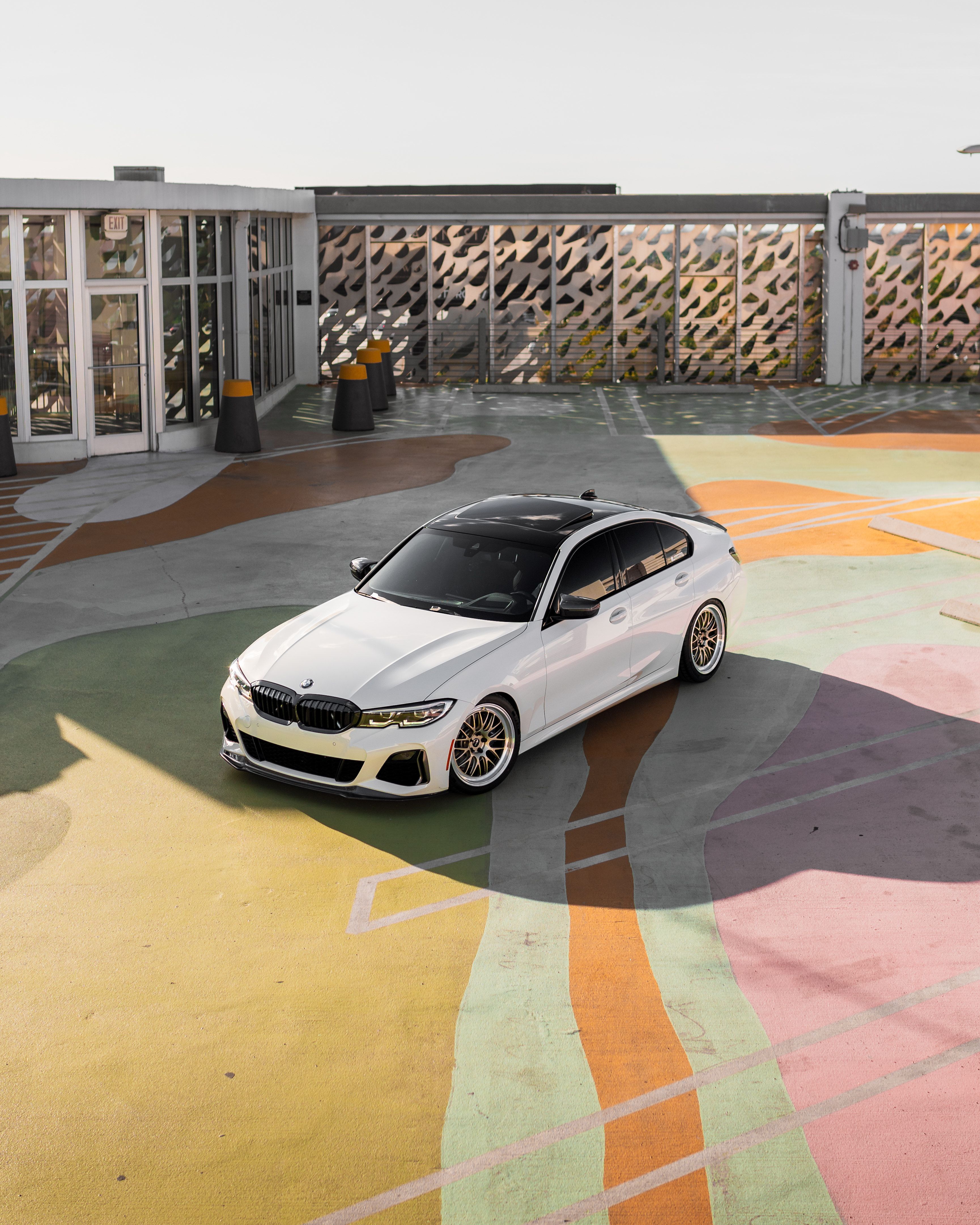 White BMW G20 Sedan 3 Series with 19" ML-10RT Apex wheels in Machined Lip Gloss Motorsport Gold