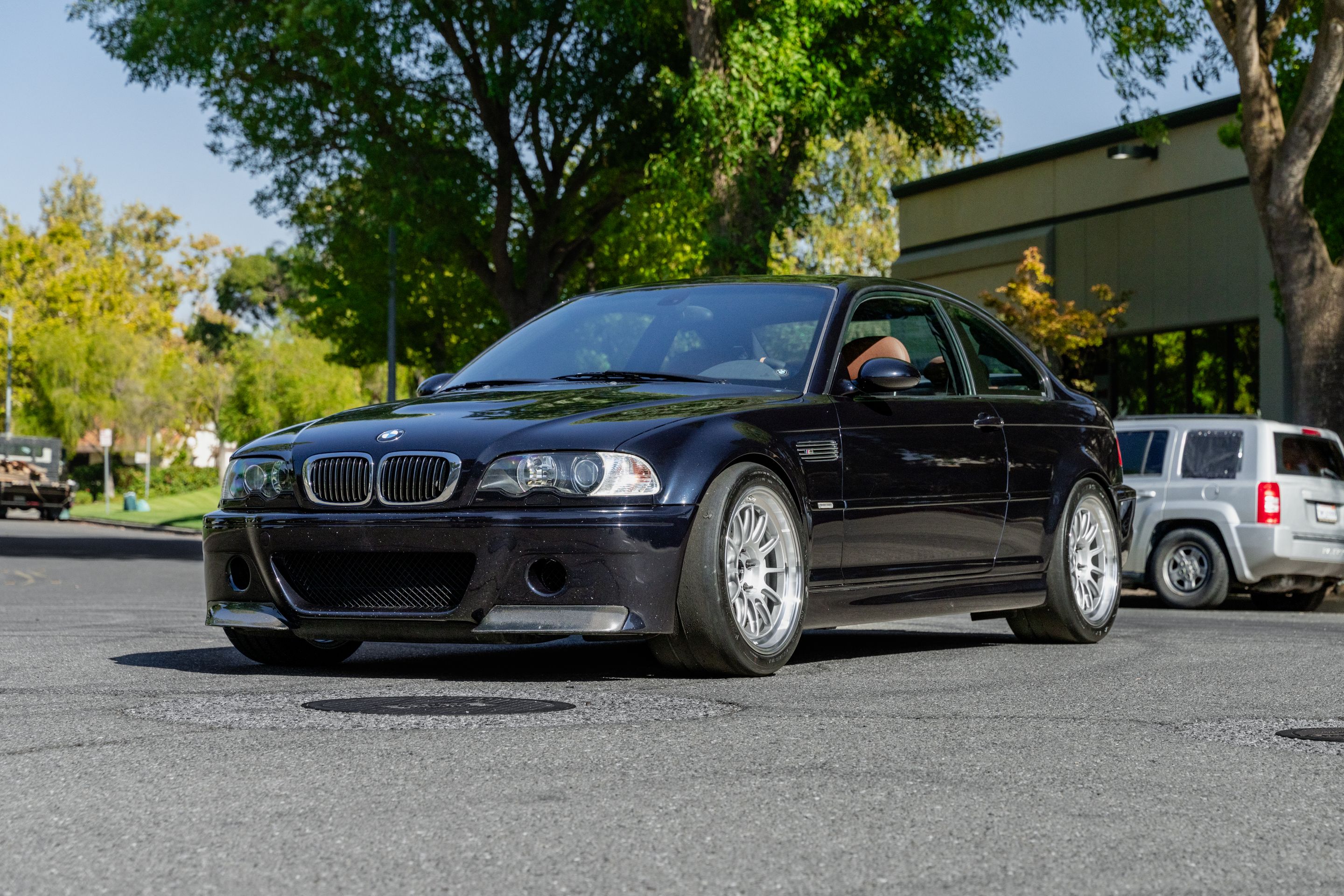 Black BMW E46 M3 with 18" SL-12 Apex wheels in Machined Lip Race Silver