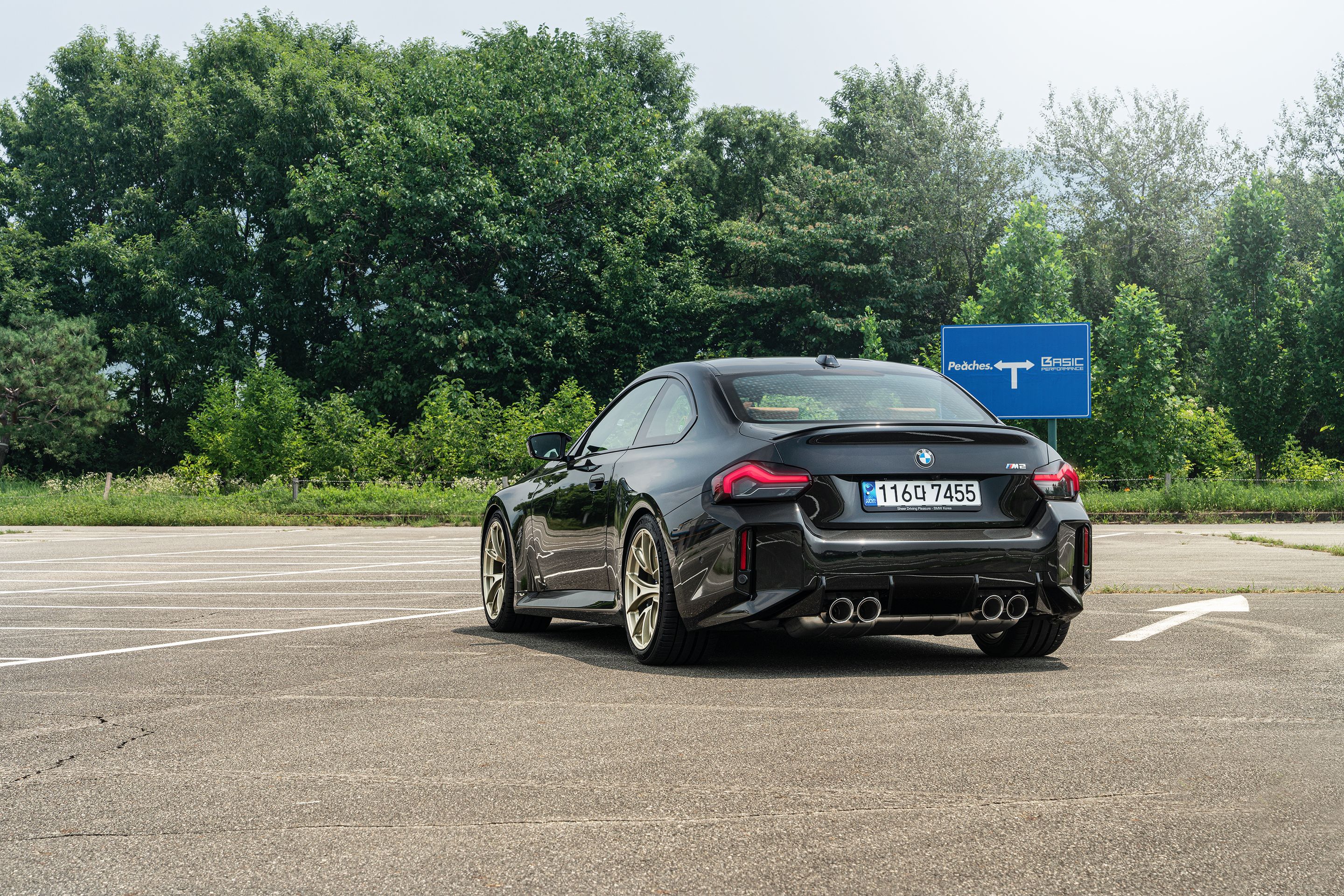 Black BMW G87 M2 with 19" VS-5RS Apex wheels in Motorsport Gold