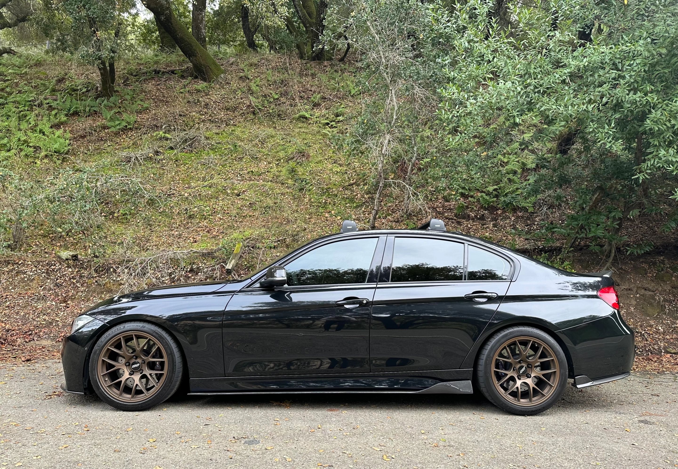 Black BMW F30 Sedan 3 Series with 18" EC-7 Apex wheels in Satin Bronze