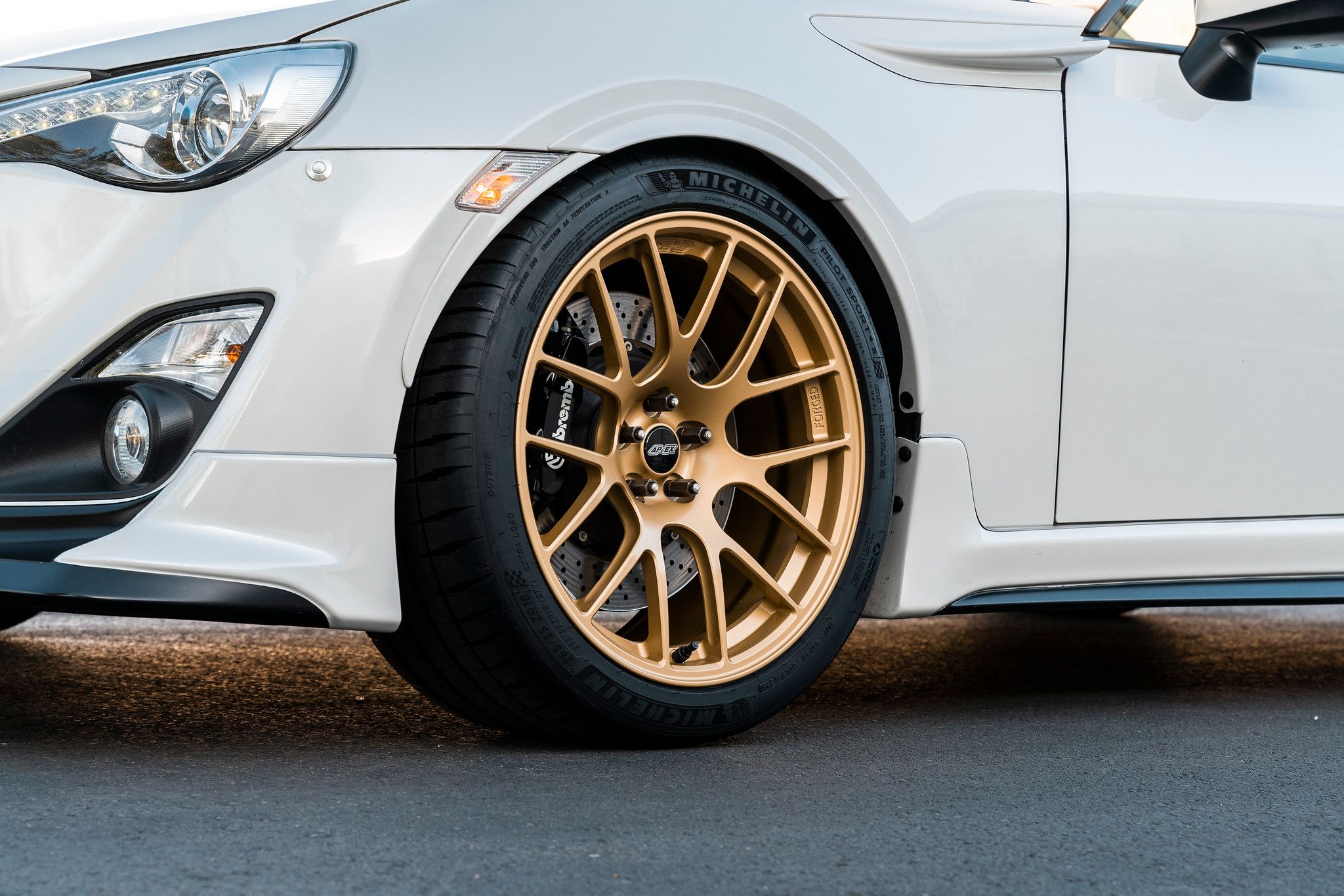 White Scion FR-S with 18" EC-7R Apex wheels in Satin Gold