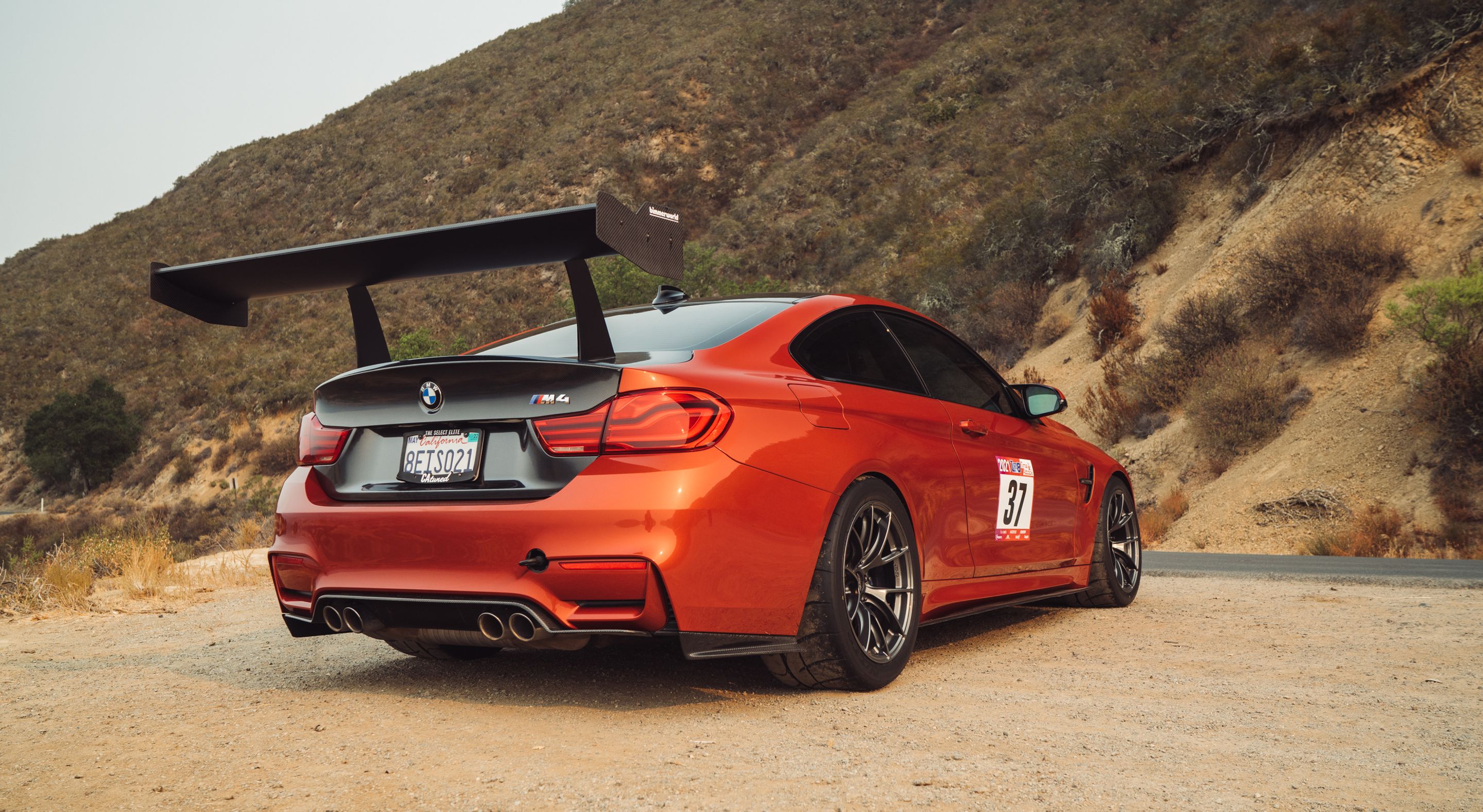 Orange BMW F82 Coupe M4 with 18" VS-5RS Apex wheels in Anthracite