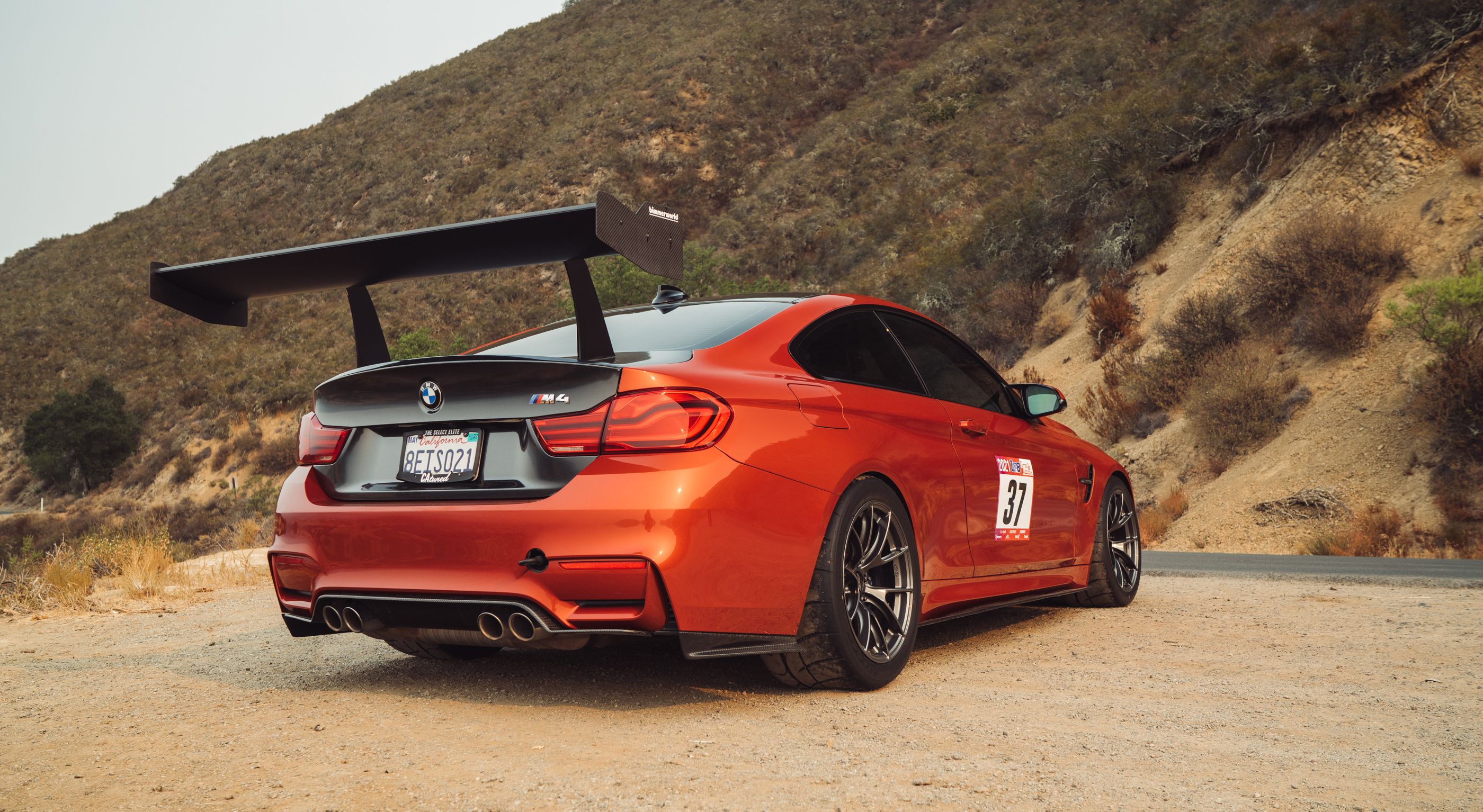 Orange BMW F82 Coupe M4 with 18" VS-5RS Apex wheels in Anthracite