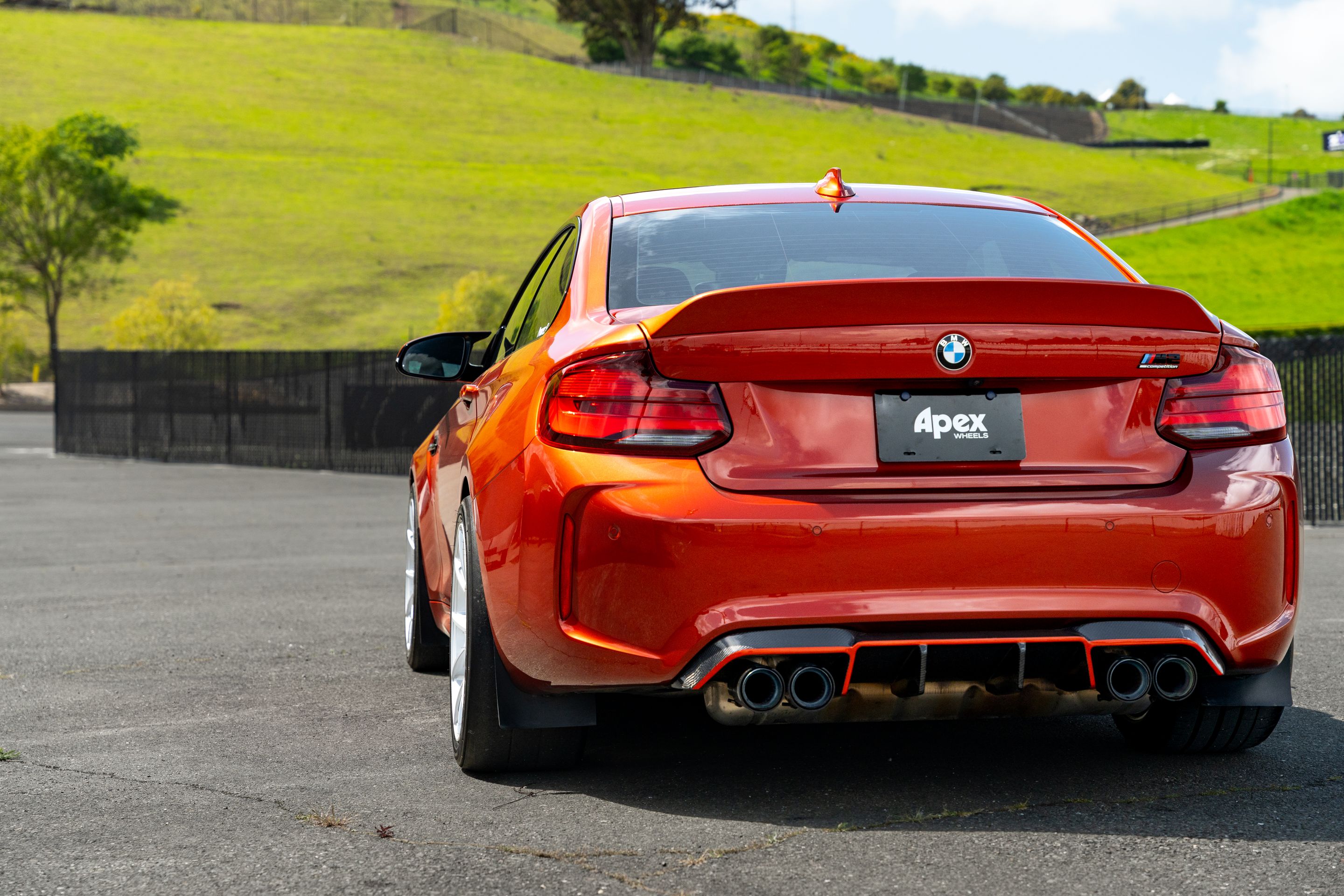 Orange BMW F87 M2 with 18" VS-5 Apex wheels in Race Silver
