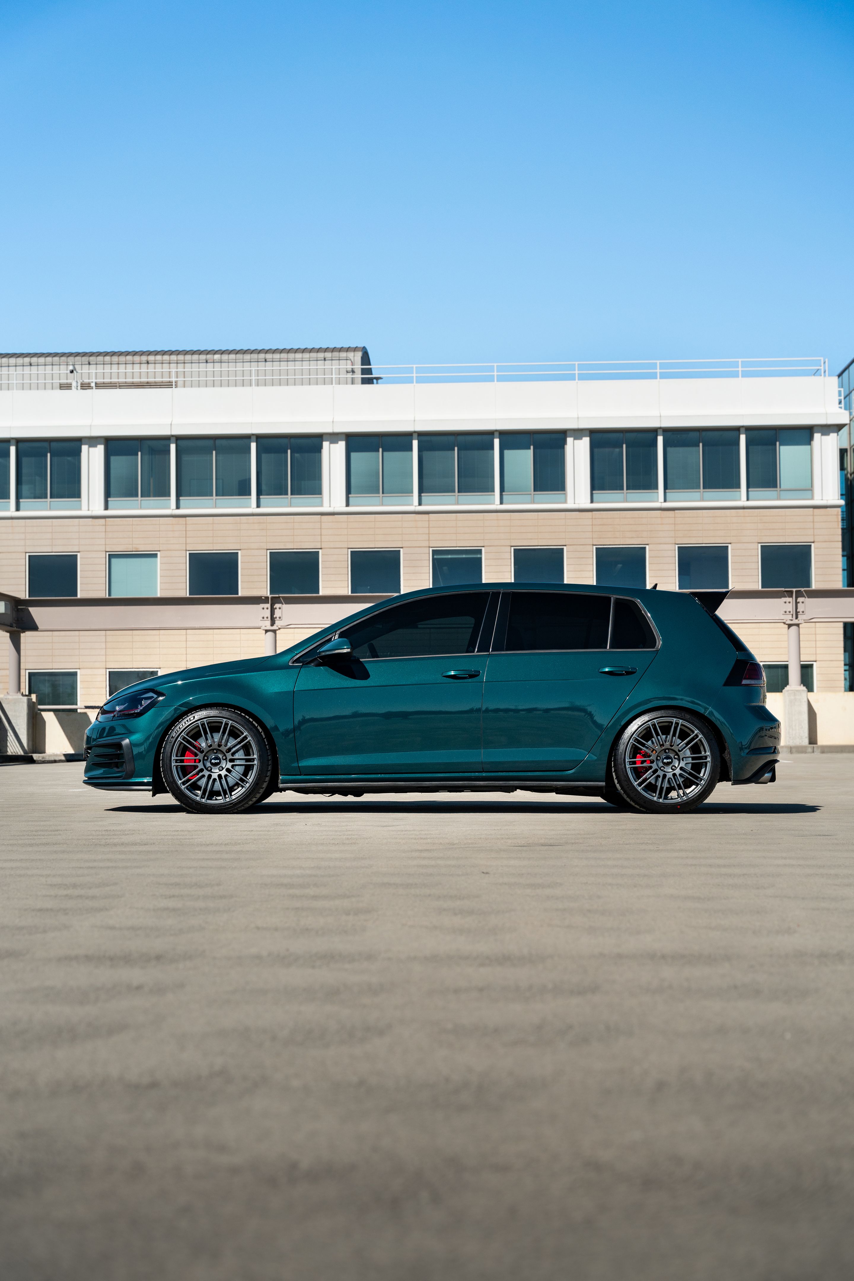 Green VW MK7 GTI with 18" TC-10RT Apex wheels in Anthracite