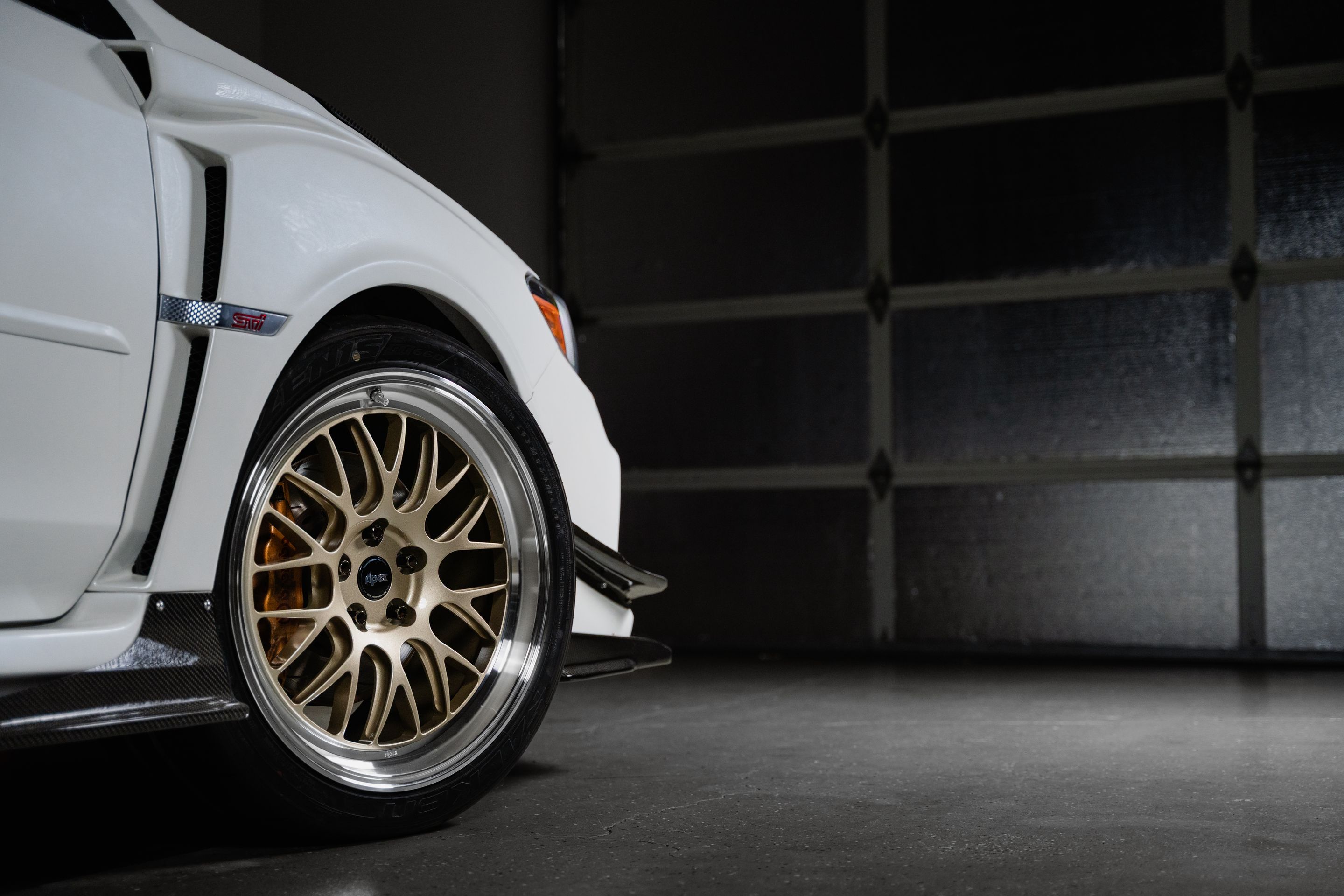 White Subaru VA WRX STI with 18" ML-10RT Apex wheels in Machined Lip Gloss Motorsport Gold