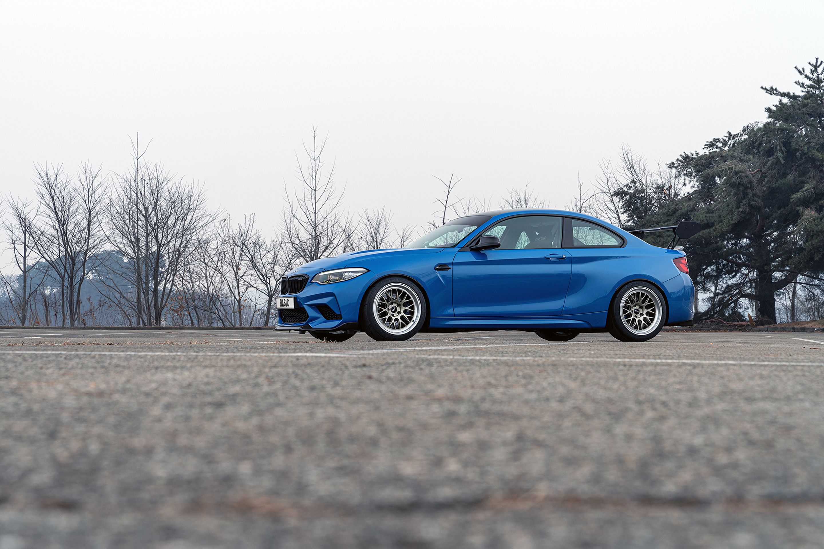 Blue BMW F87 M2 with 18" ML-10RT Apex wheels in Machined Lip Gloss Motorsport Gold