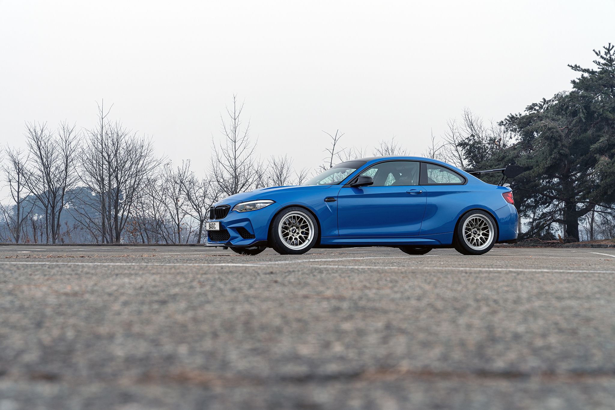 Blue BMW F87 M2 with 18" ML-10RT Apex wheels in Machined Lip Gloss Motorsport Gold