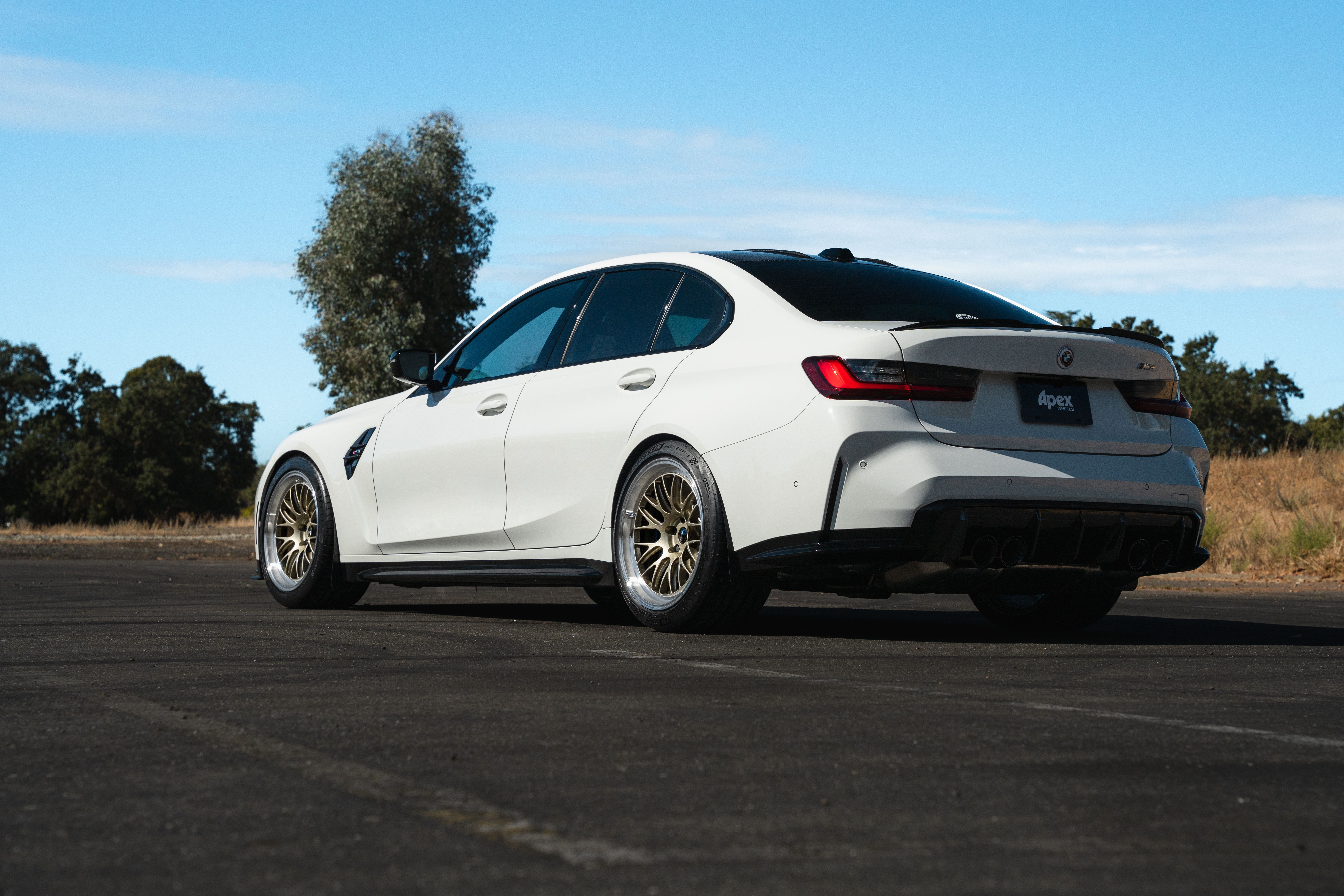 White BMW G80 M3 with 19" ML-10RT Apex wheels in Machined Lip Gloss Motorsport Gold
