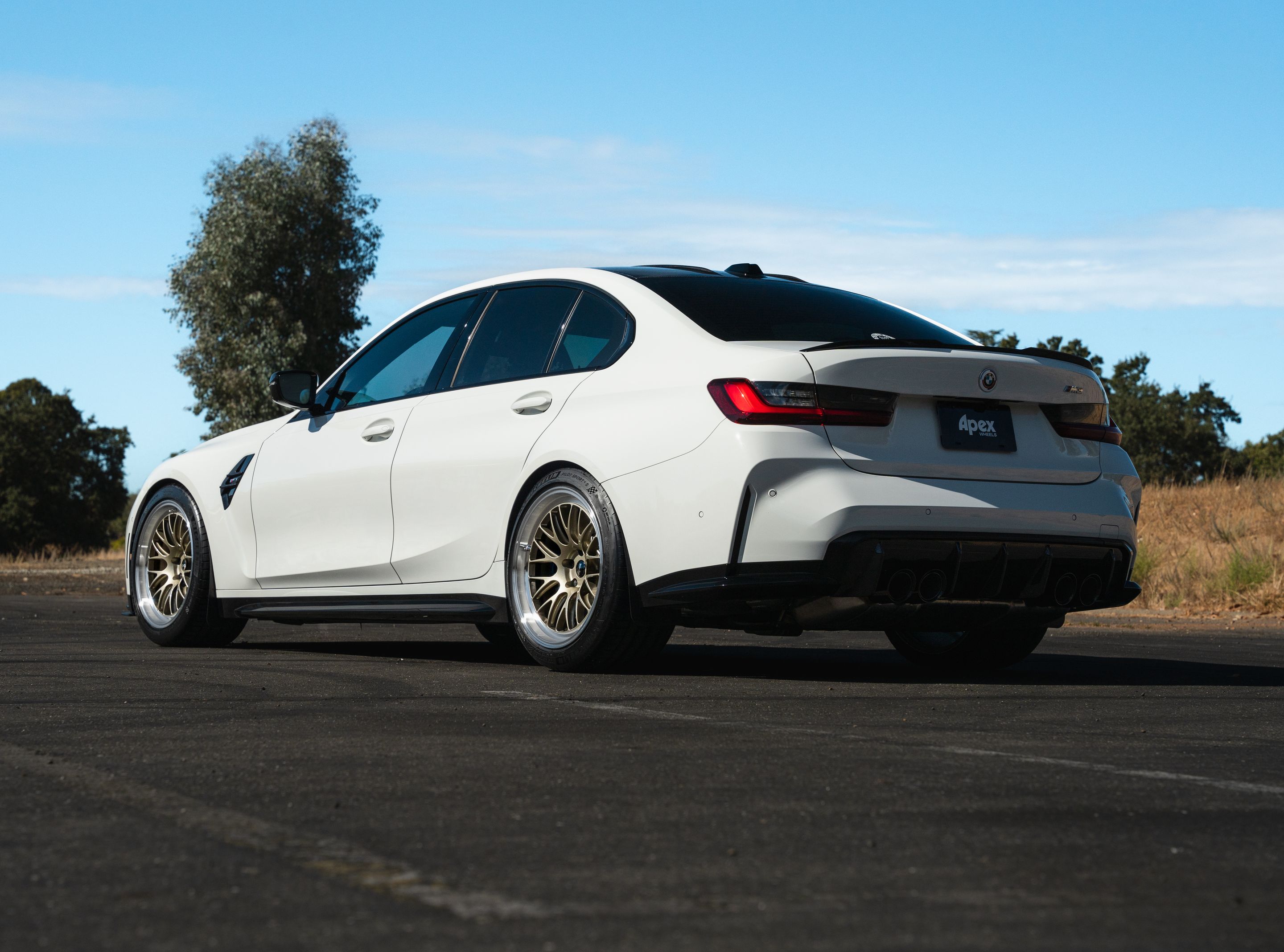 White BMW G80 M3 with 19" ML-10RT Apex wheels in Machined Lip Gloss Motorsport Gold