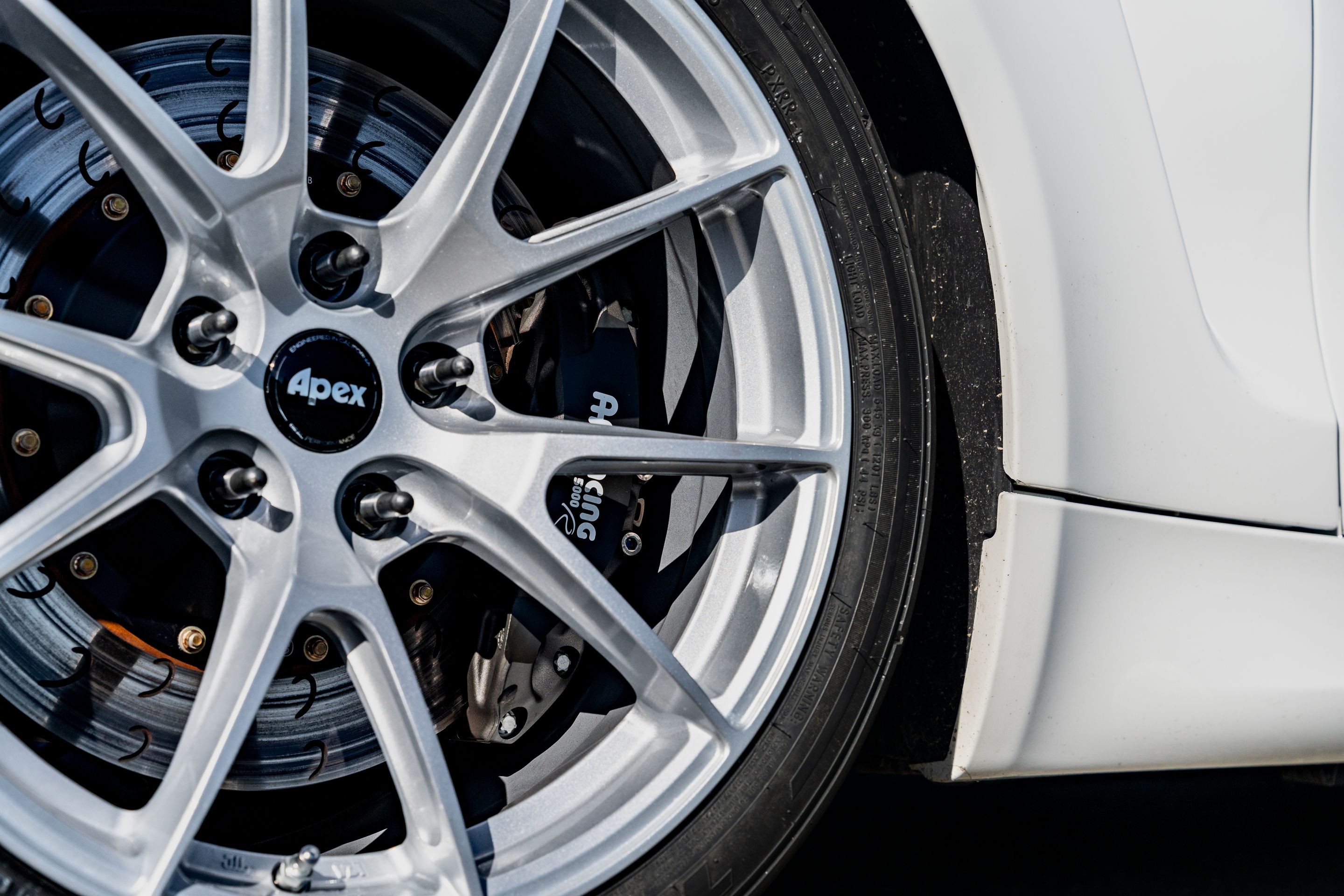 White BMW E82 1M with 18" VS-5 Apex wheels in Race Silver