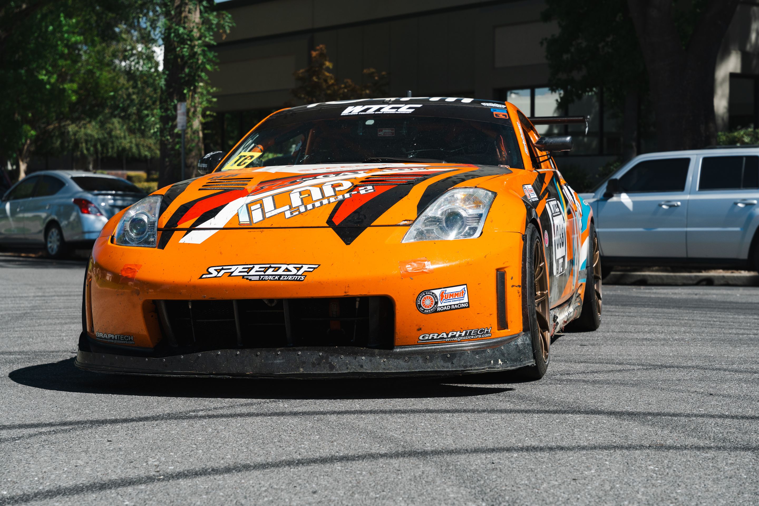Orange Nissan 350Z with 18" VS-5RS Apex wheels in Satin Bronze
