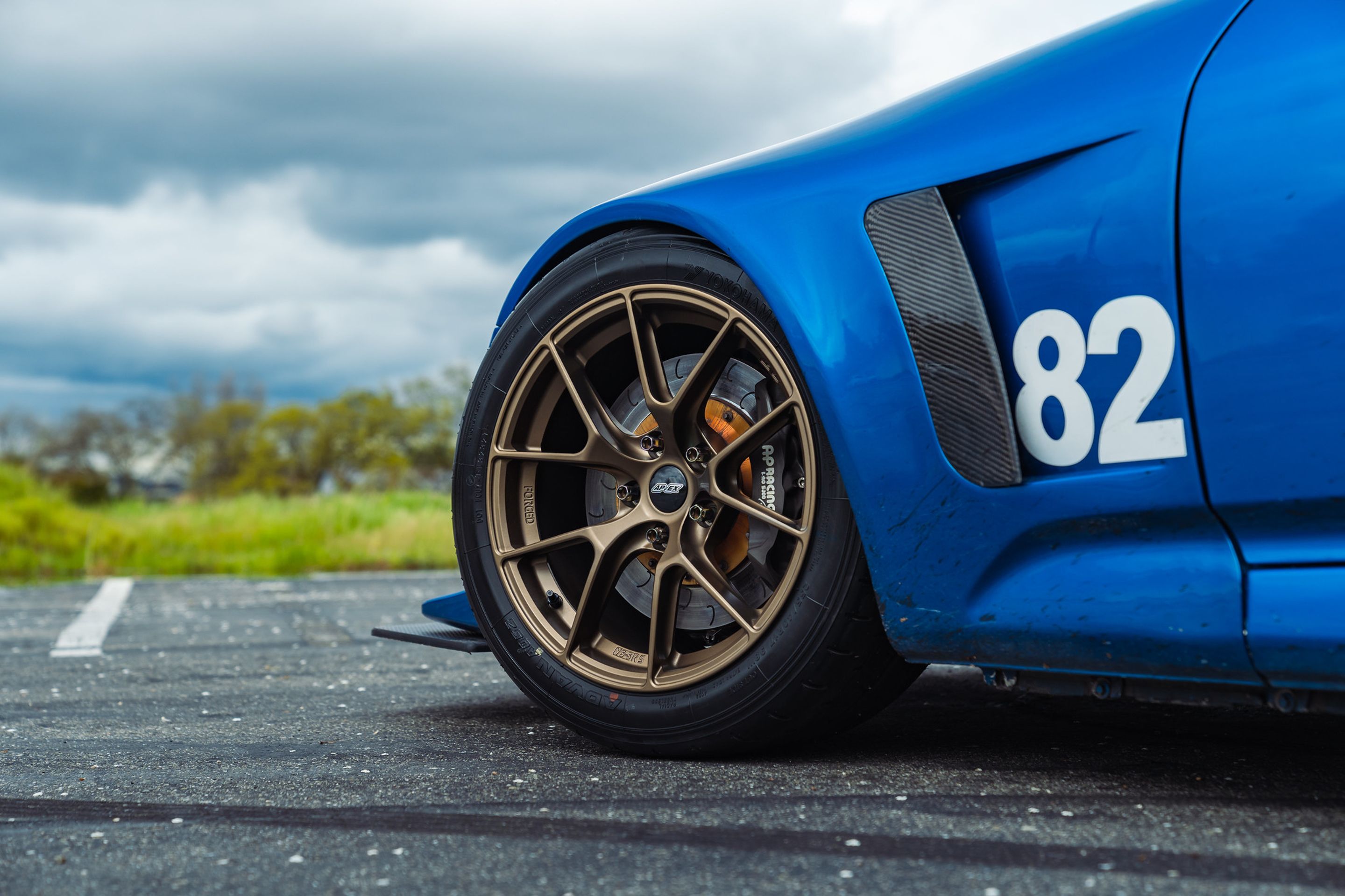 Blue Honda S2000 with 17" VS-5RS Apex wheels in Satin Bronze