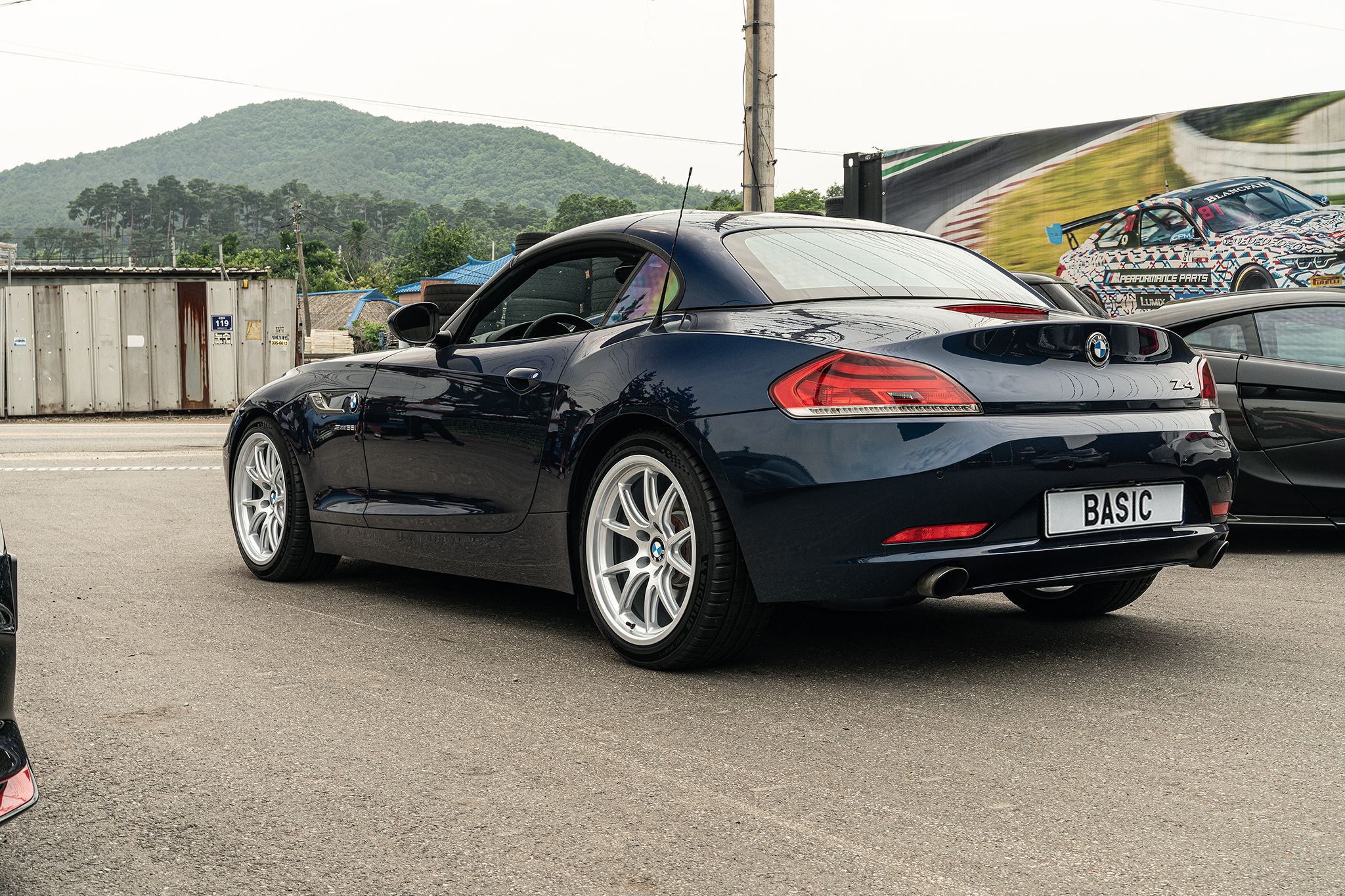 Blue BMW E89 Z4 with 18" FL-5 Apex wheels in Race Silver